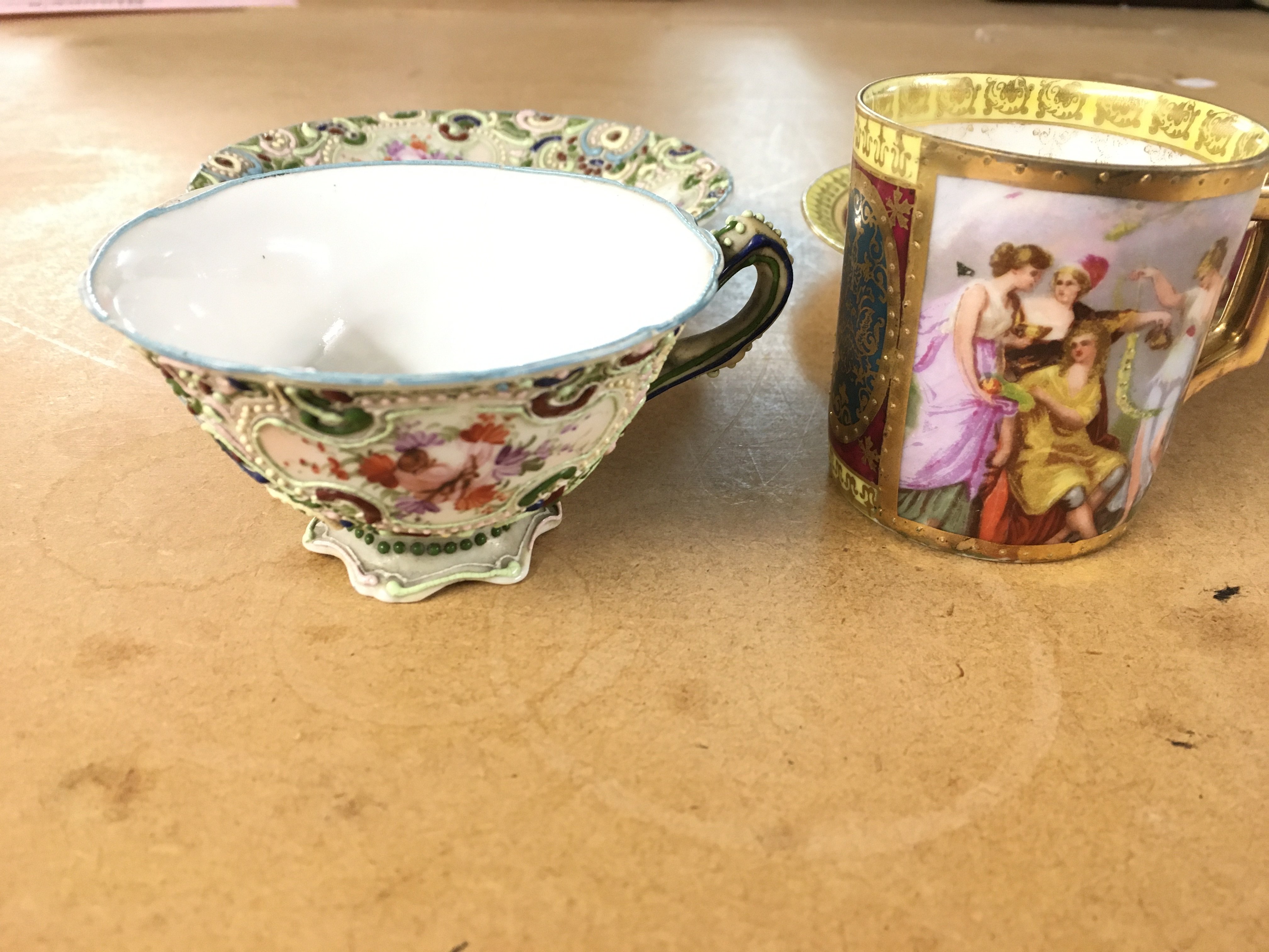 A Vienna coffee cup and saucer together with an early Noritake cup and saucer. Hairline to noritake cup otherwise good.