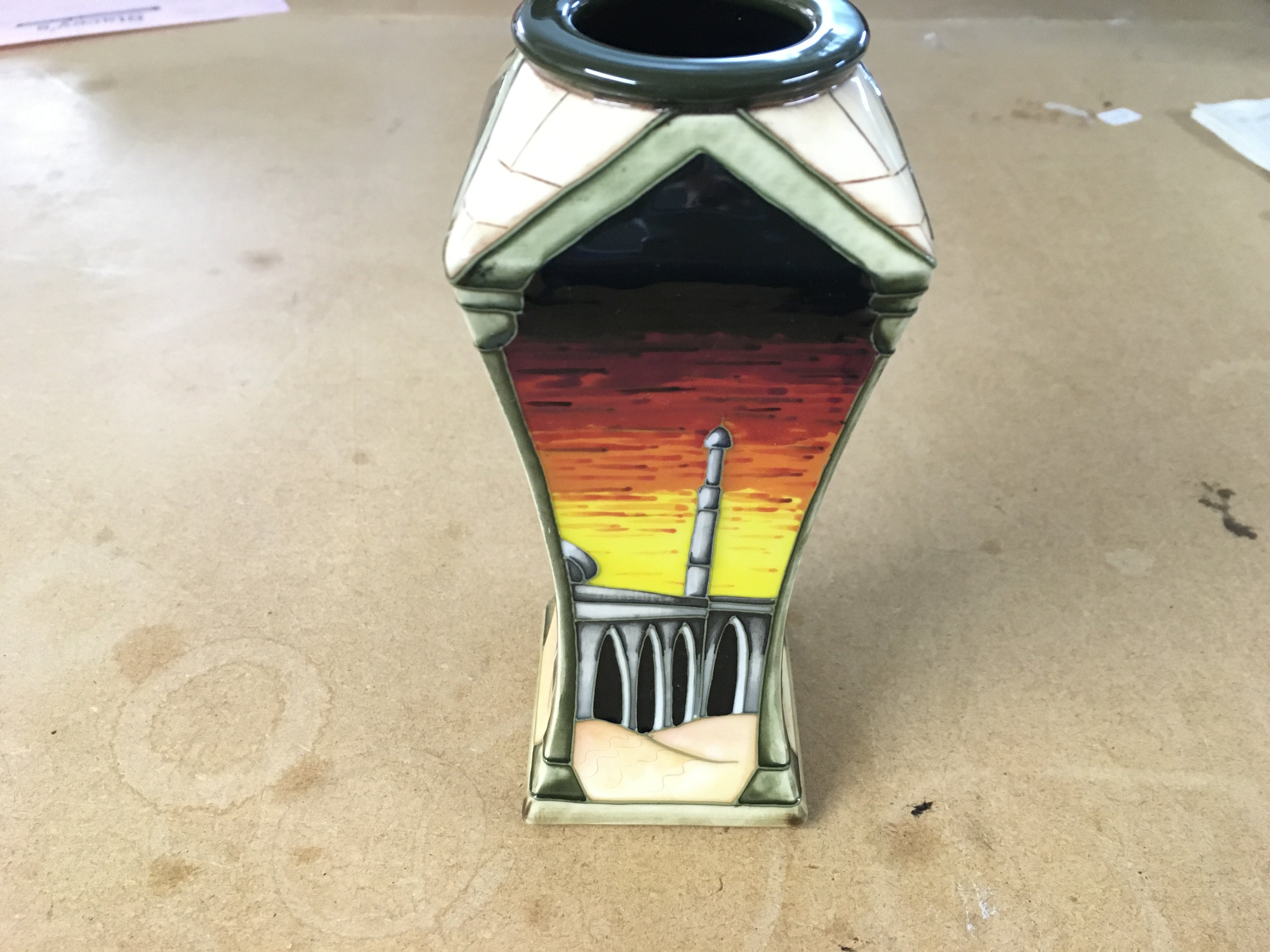 A moorcroft damascus vase designed by Beverley Wilkes 2009. 16.5cm tall and in good condition.