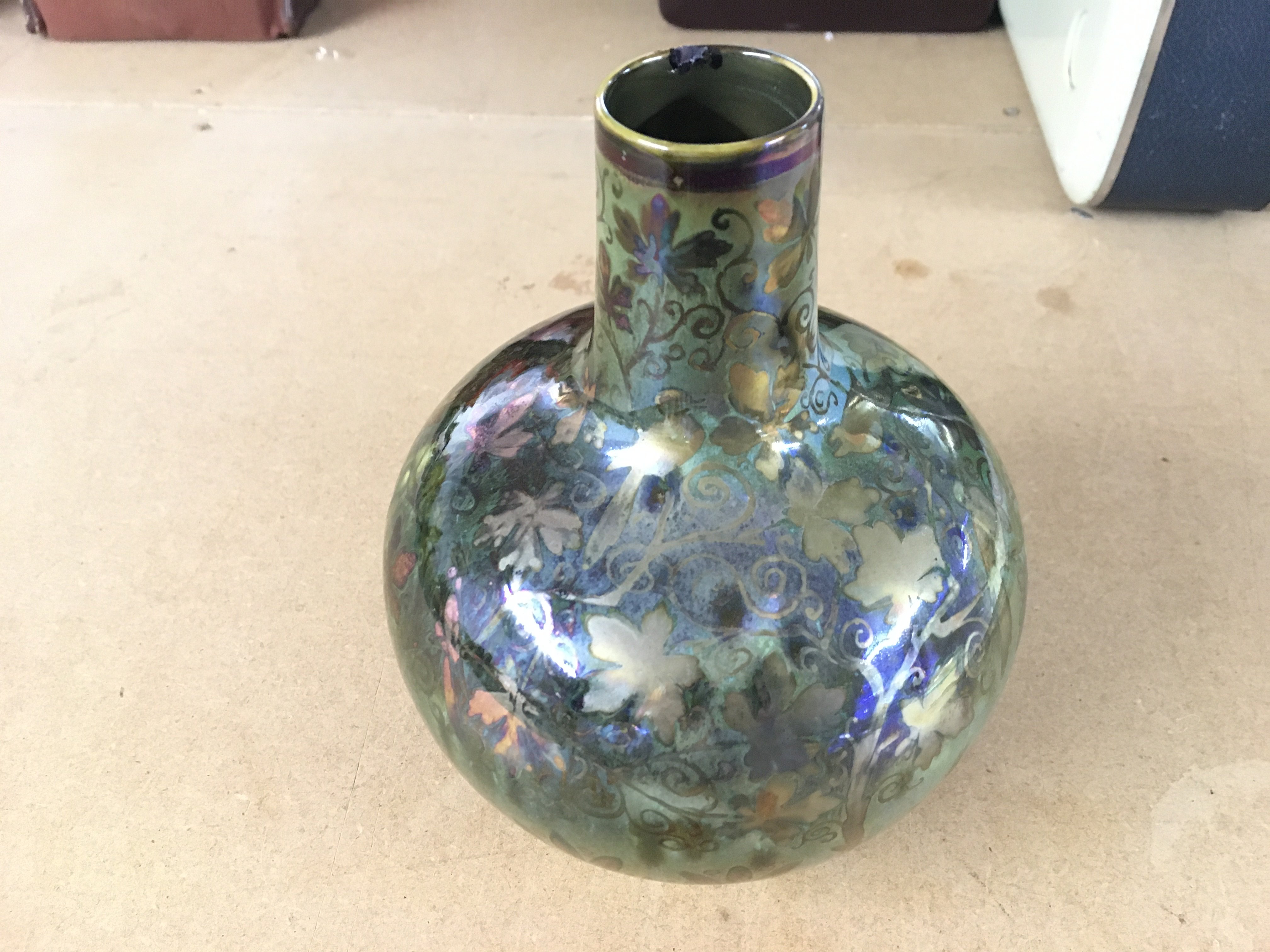 Richard Joyce Pilkington Royal Lancastrian luster vase with leaves. Hairline crack and chip to rim. 17cm tall.