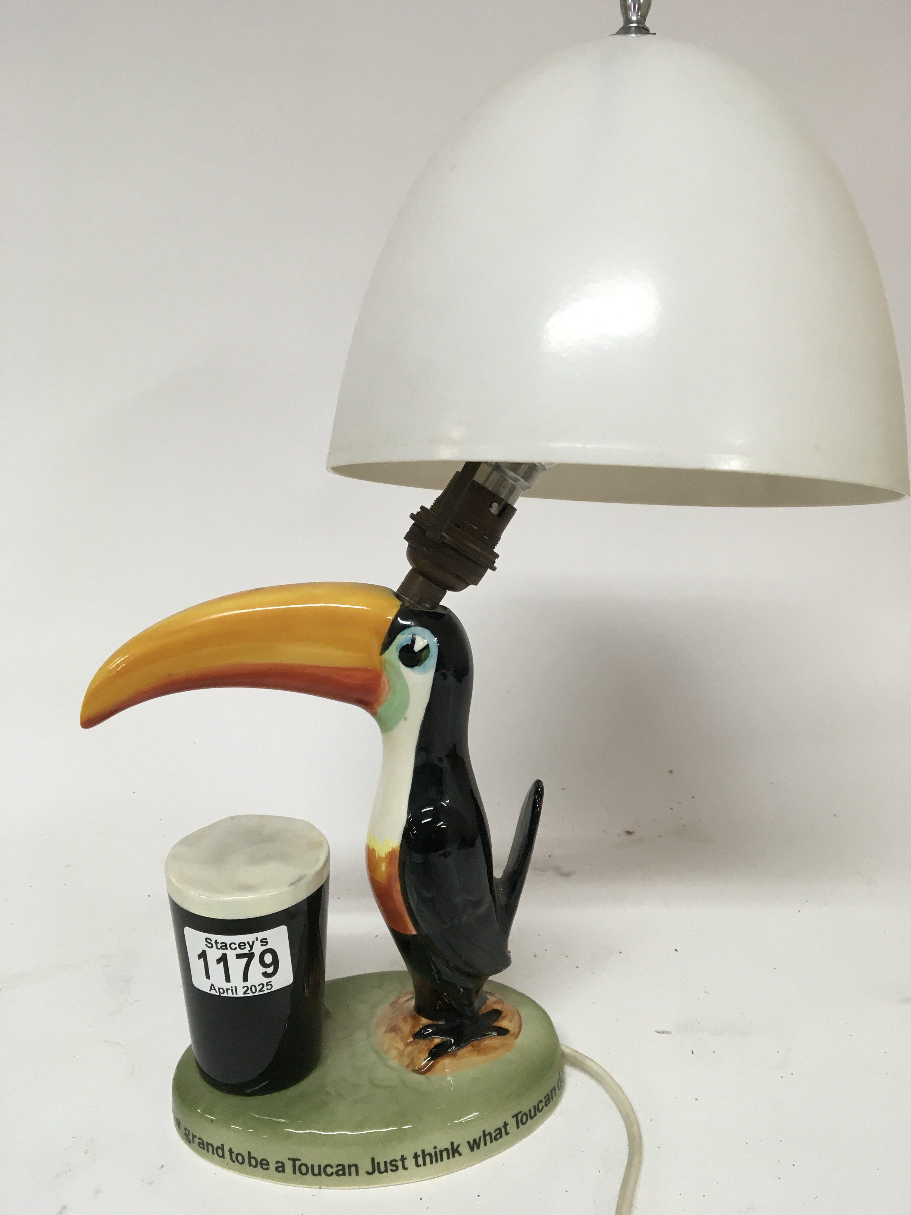 A Genuine Vintage Carlton Ware Guinness Tucan lamp height including later shade 44cm.