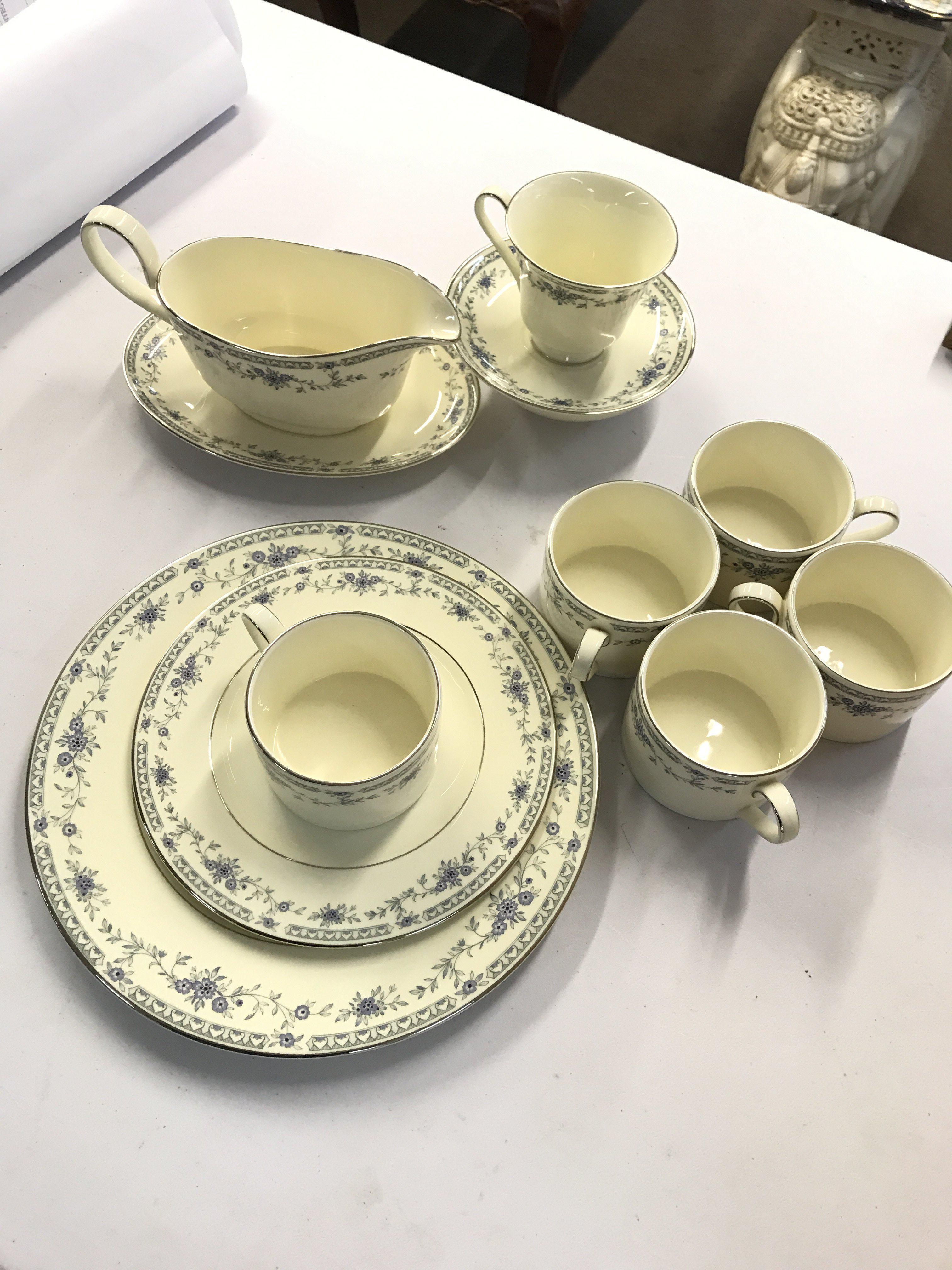 A Minton Bellmeade Tea and Dinner service including cups, plates, gravy boat etc