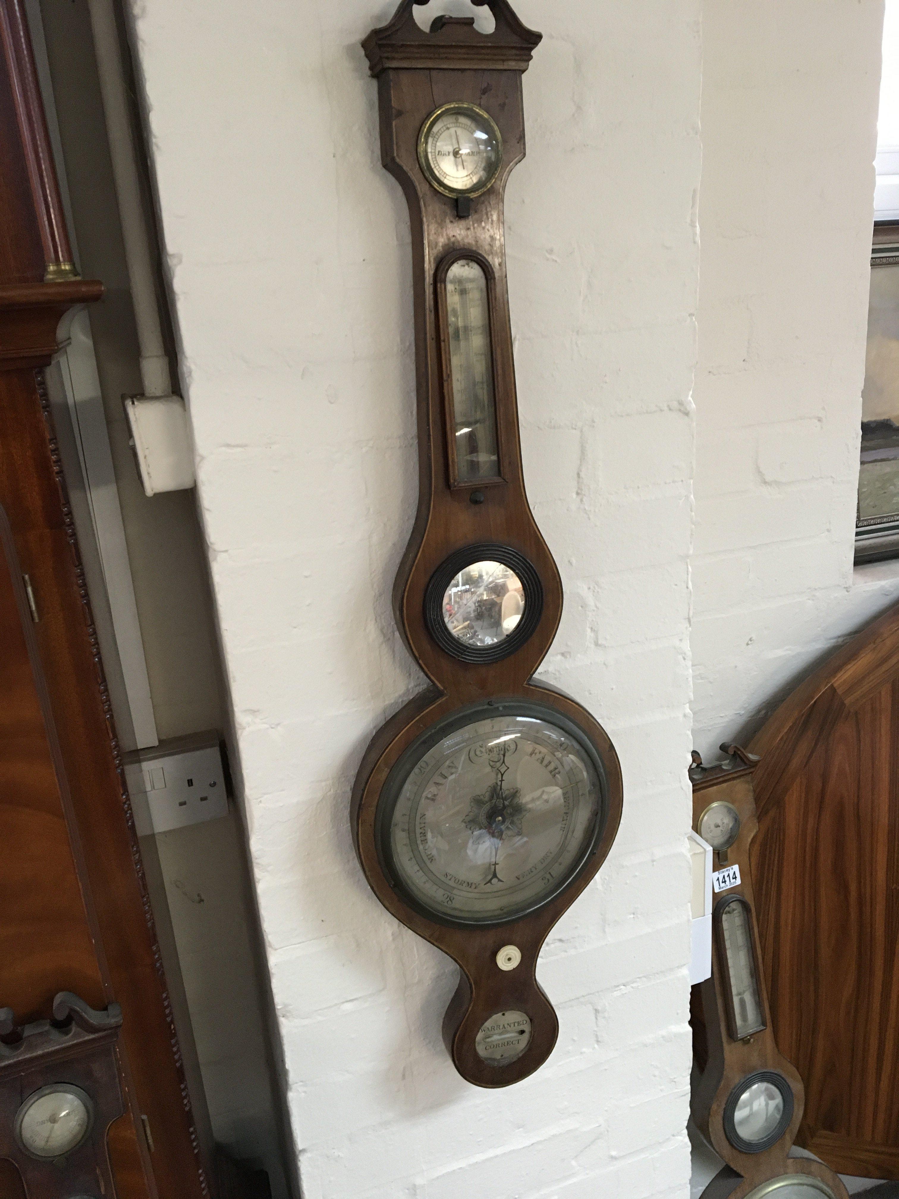 A Late George III mahogany barometer with a boxwood and ebony inlaid edge some restoration required sold without reserve. NO RESERVE