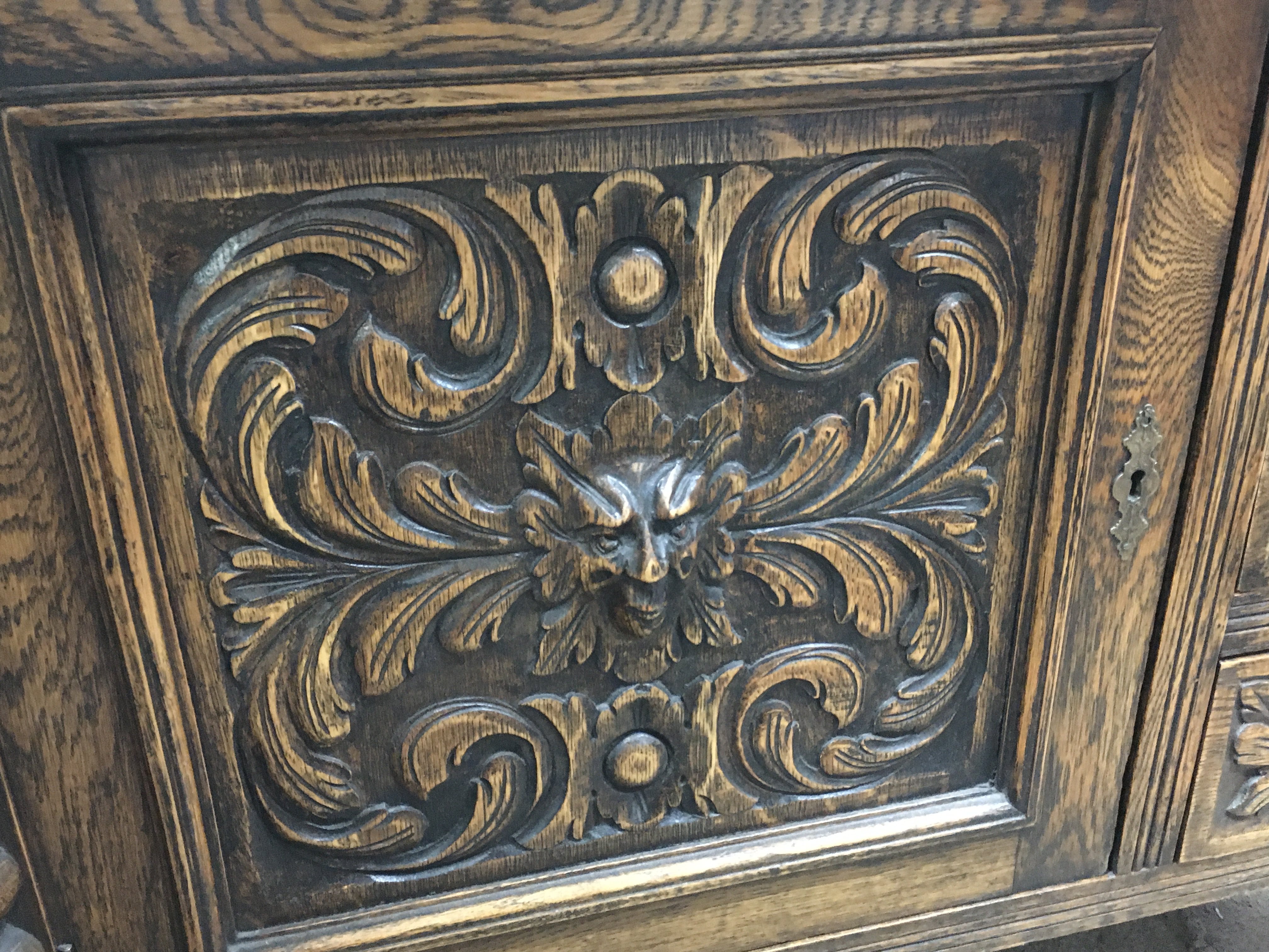 A late Victorian oak carved gothic style sideboard , dimensions 136x60x130cm