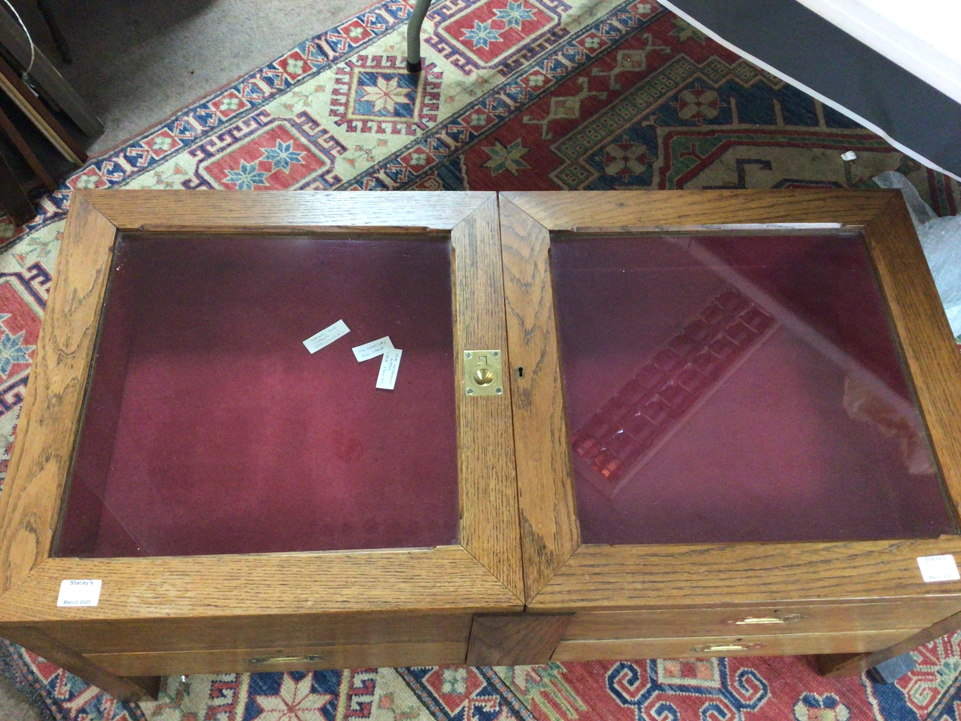 A quality bespoke made objects of virtue display table with two glazed top sections hinged with brass fittings above lined drawers. 107cm wide x 54cm