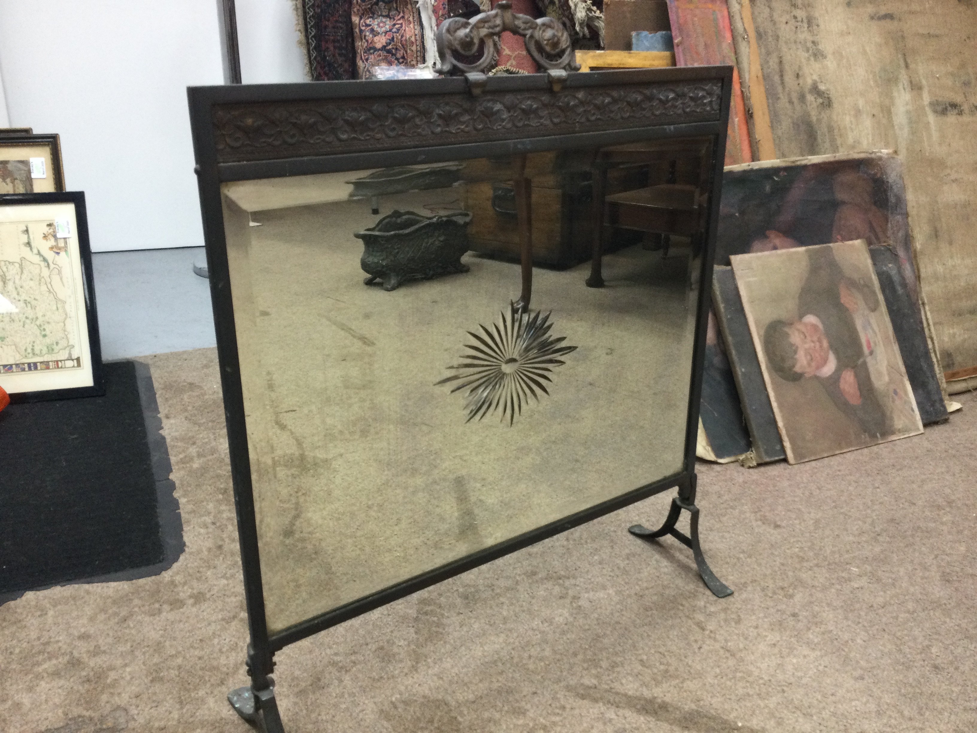 A 1930s glass mirror fire screen, 73cm tall 62cm wide
