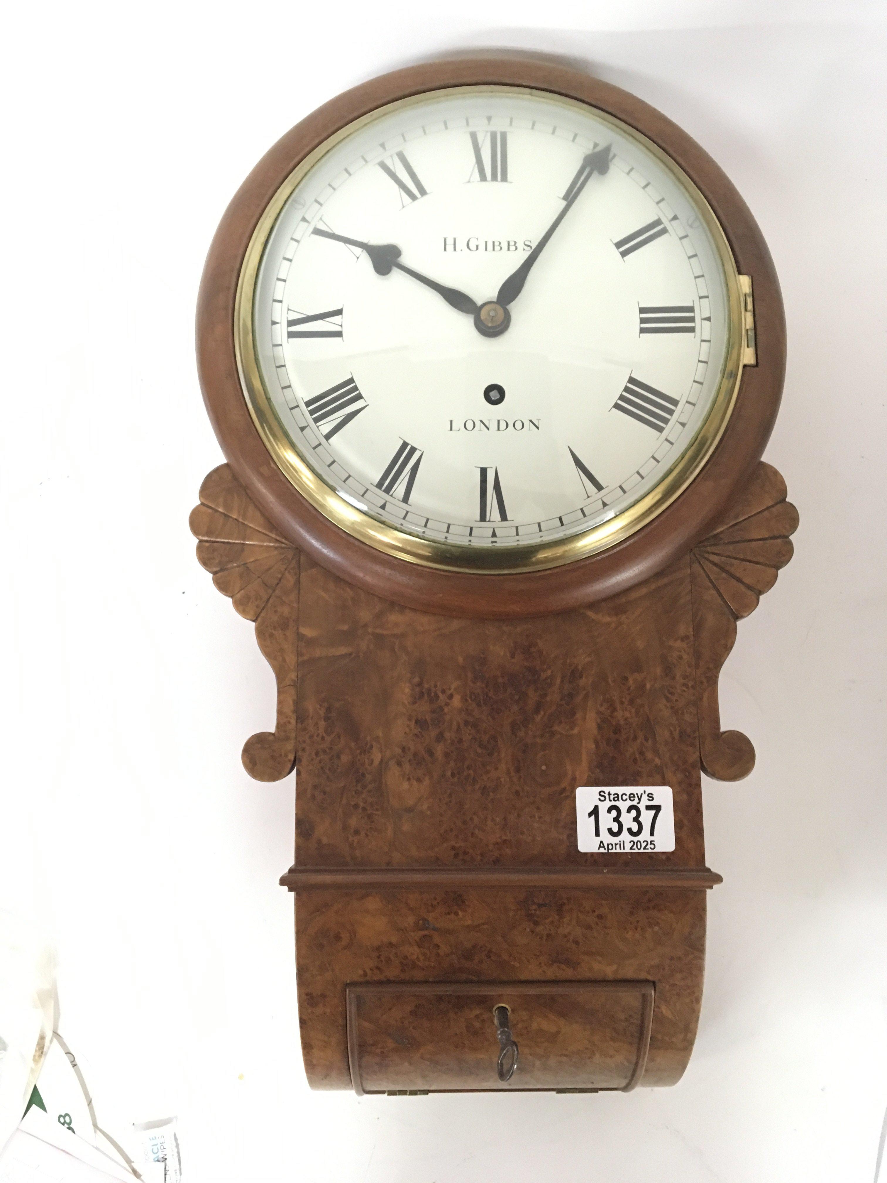 A Quality late 19th century burr walnut cased wall clock with a single fusee movement brass pendulum the dial with makers inscription H Gibbs London. Dial diameter 25cm