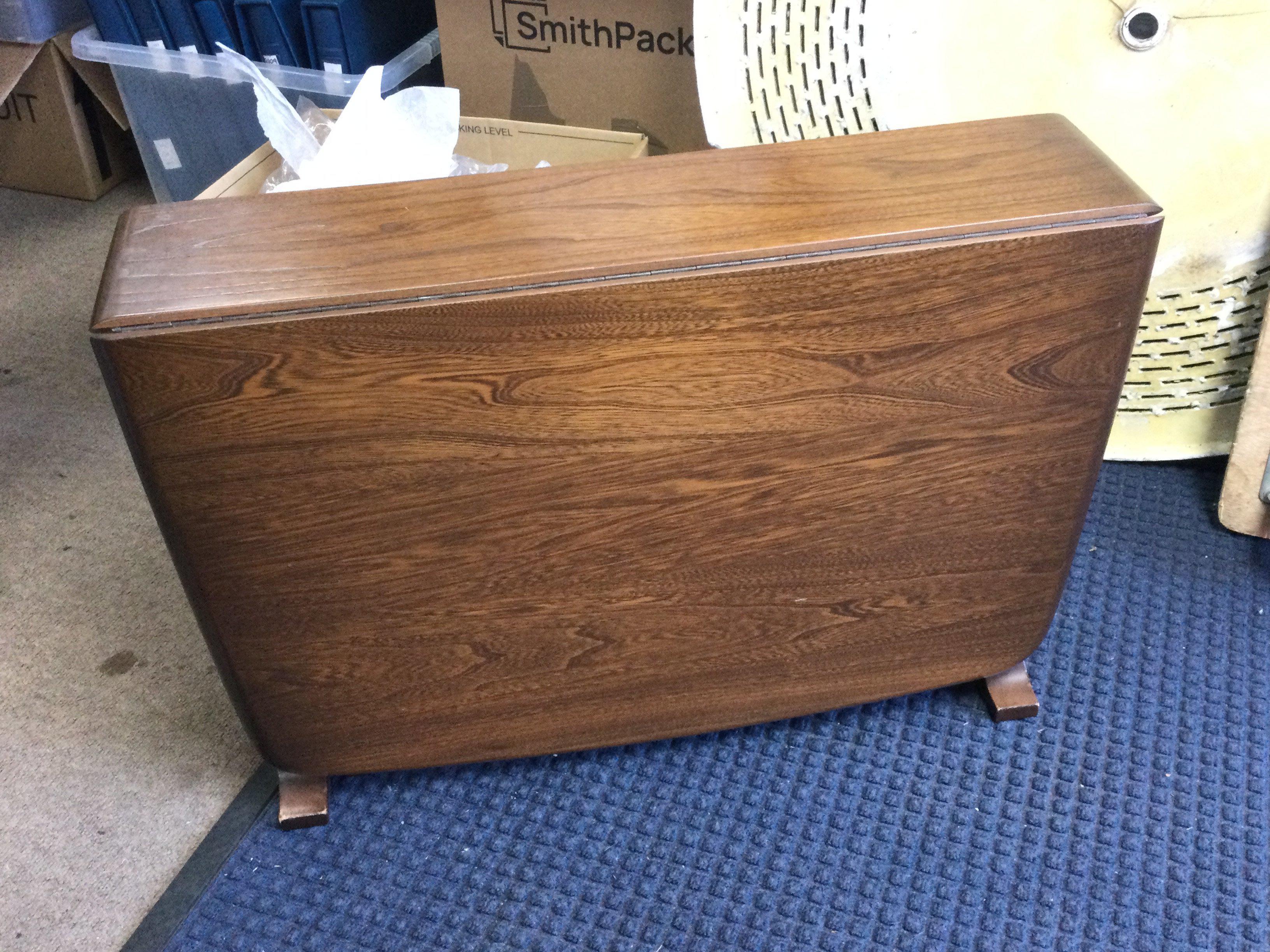 A mid 20th century Ercol drop leaf table , dimensions 70x100xx46cm
