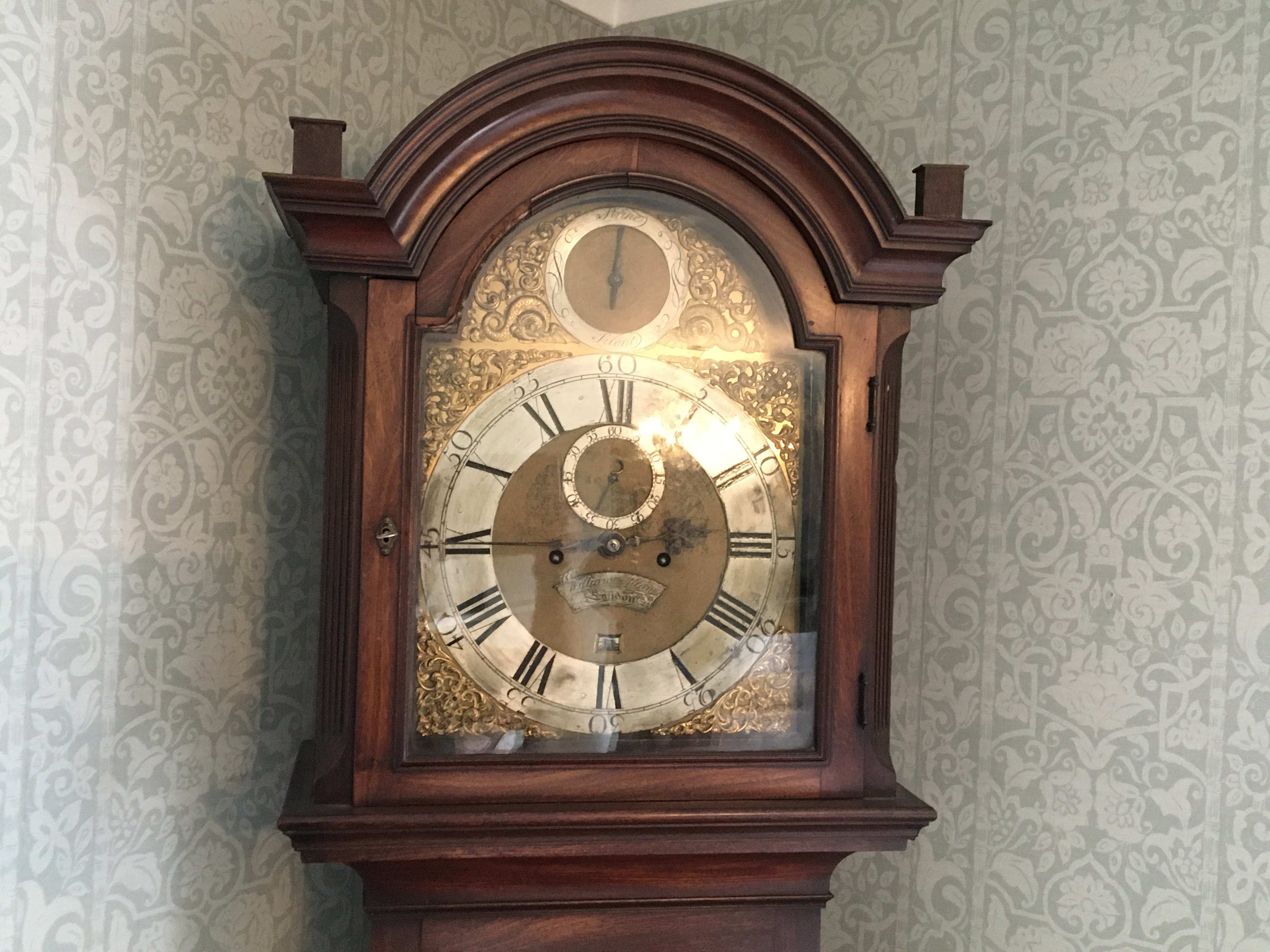 A George III mahogany long case clock the dial with a silvered chapter ring eight day going movement maker William Allan London.