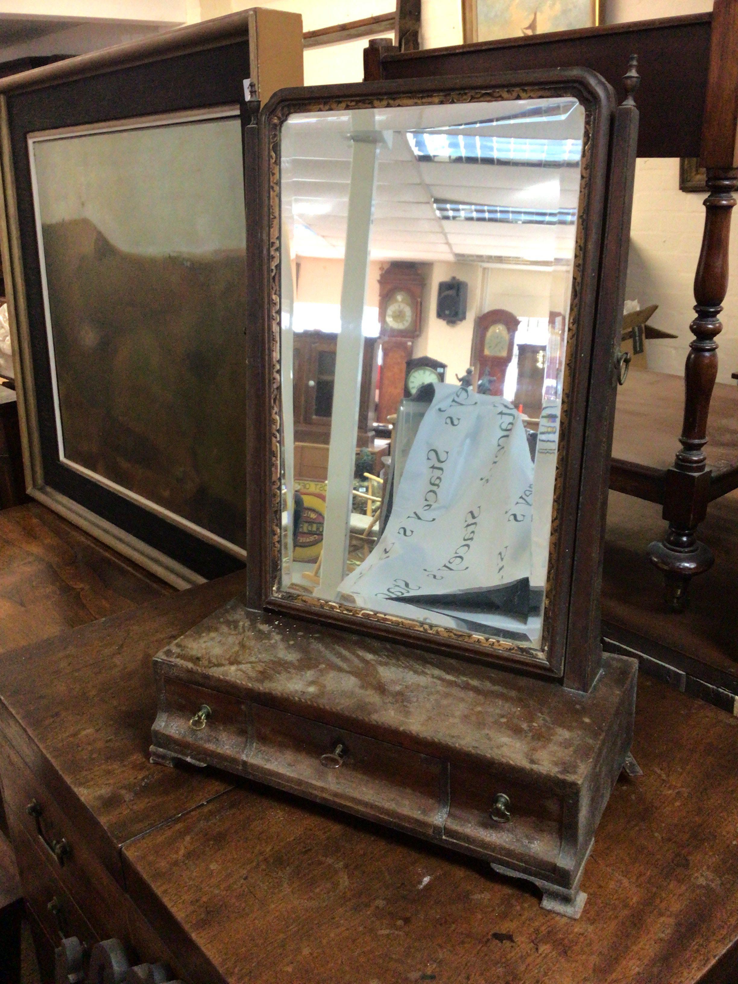 A George III mahogany dressing table mirror for restoration with a bevelled edge mirror above three drawers.