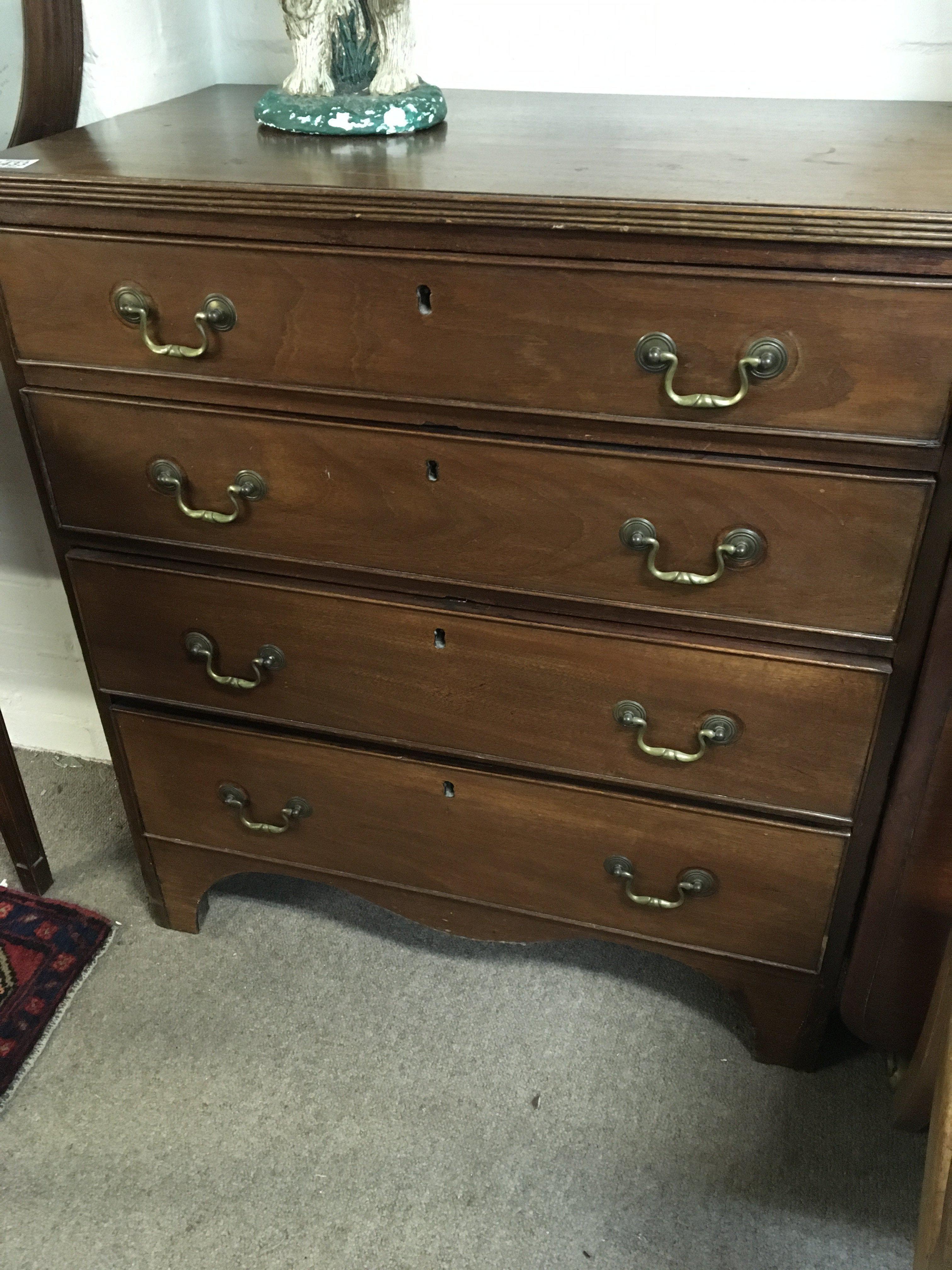 A George III mahogany chest of drawers fitted with a flight of four graduating drawers. 80cm wide