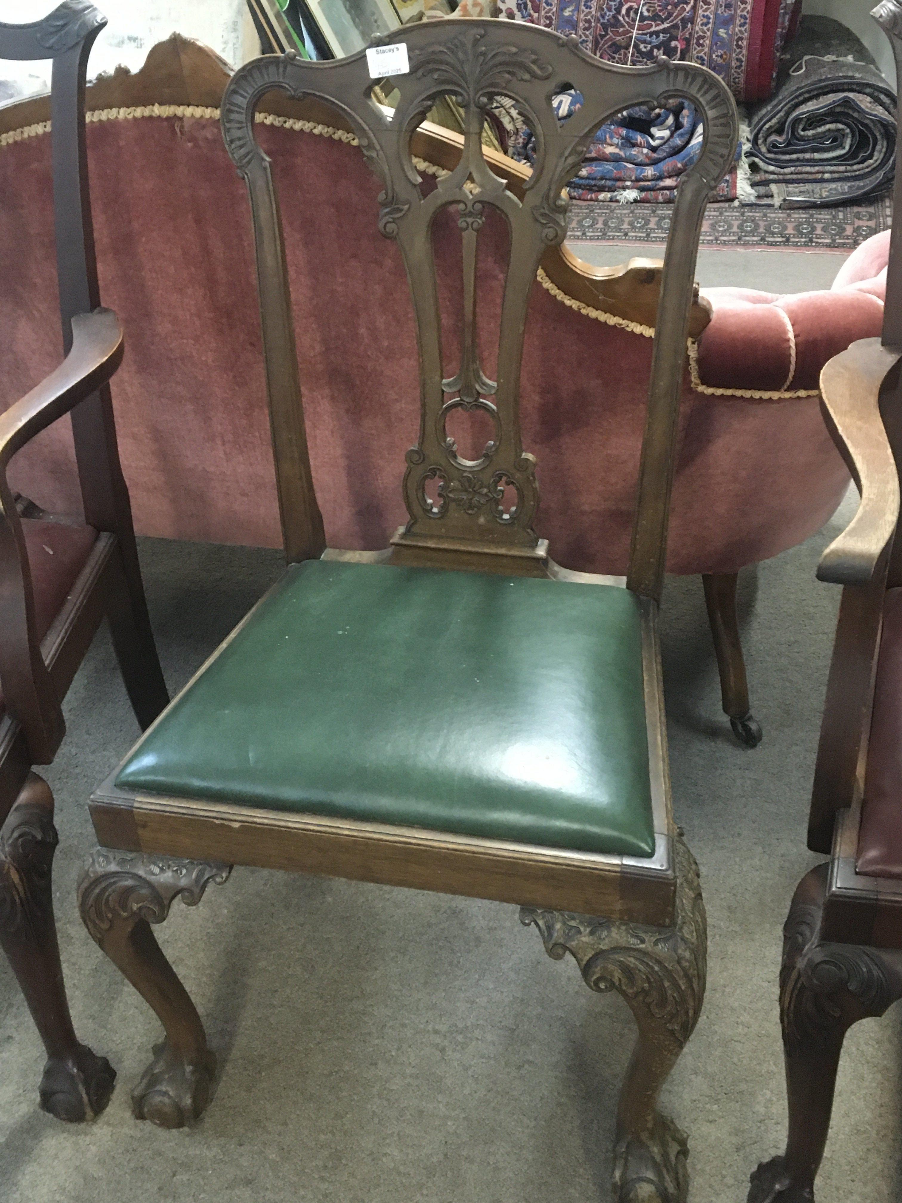 A late George III mahogany dining chair with a shaped back and drop in seat and three similar mahogany dining chairs (4&#2013266057۪