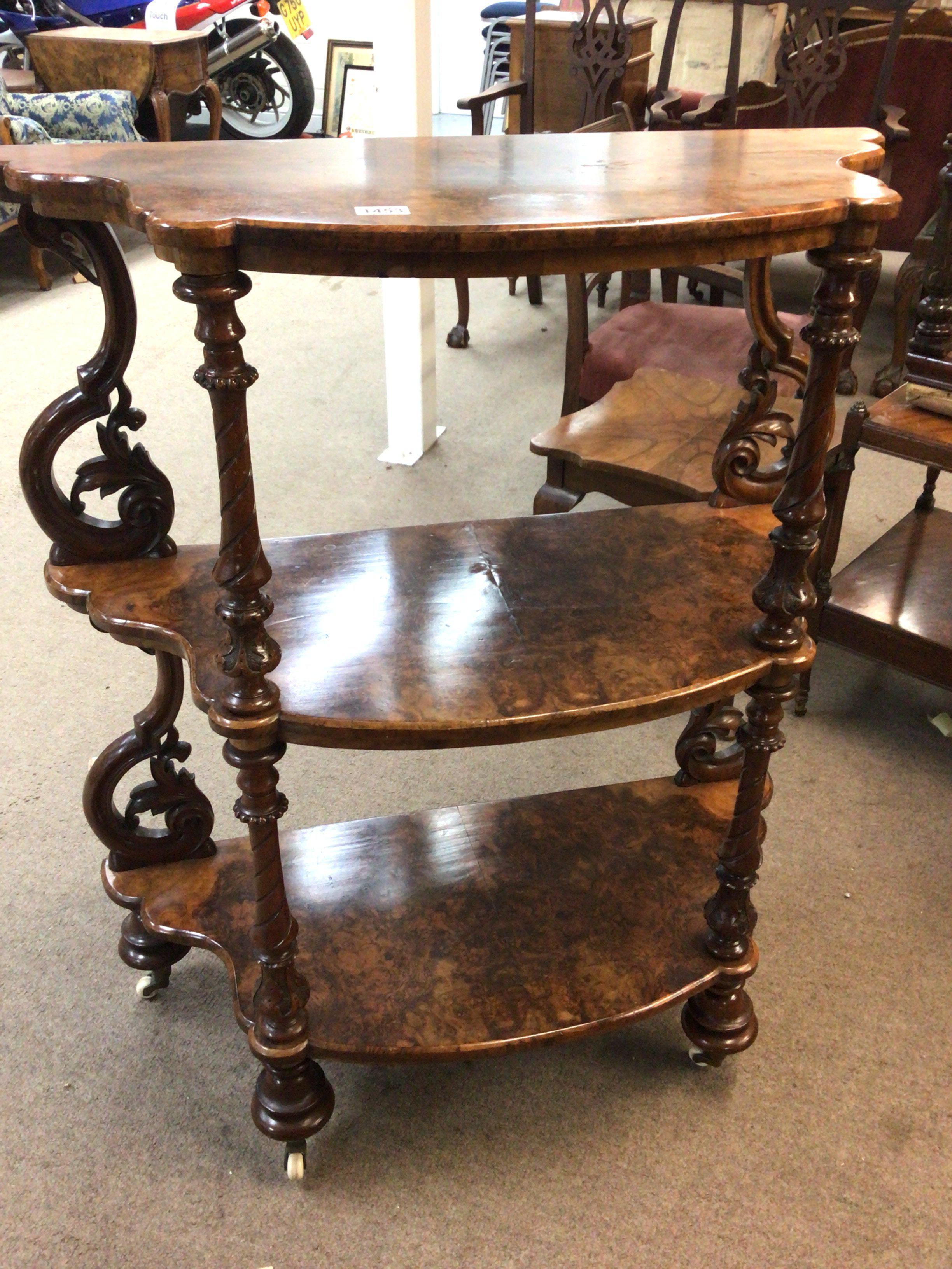 A quality Victorian burr walnut three tier open stand with shaped shelf&#2013266057۪s scroll supports and spiral turned pilasters. Hight 106cm