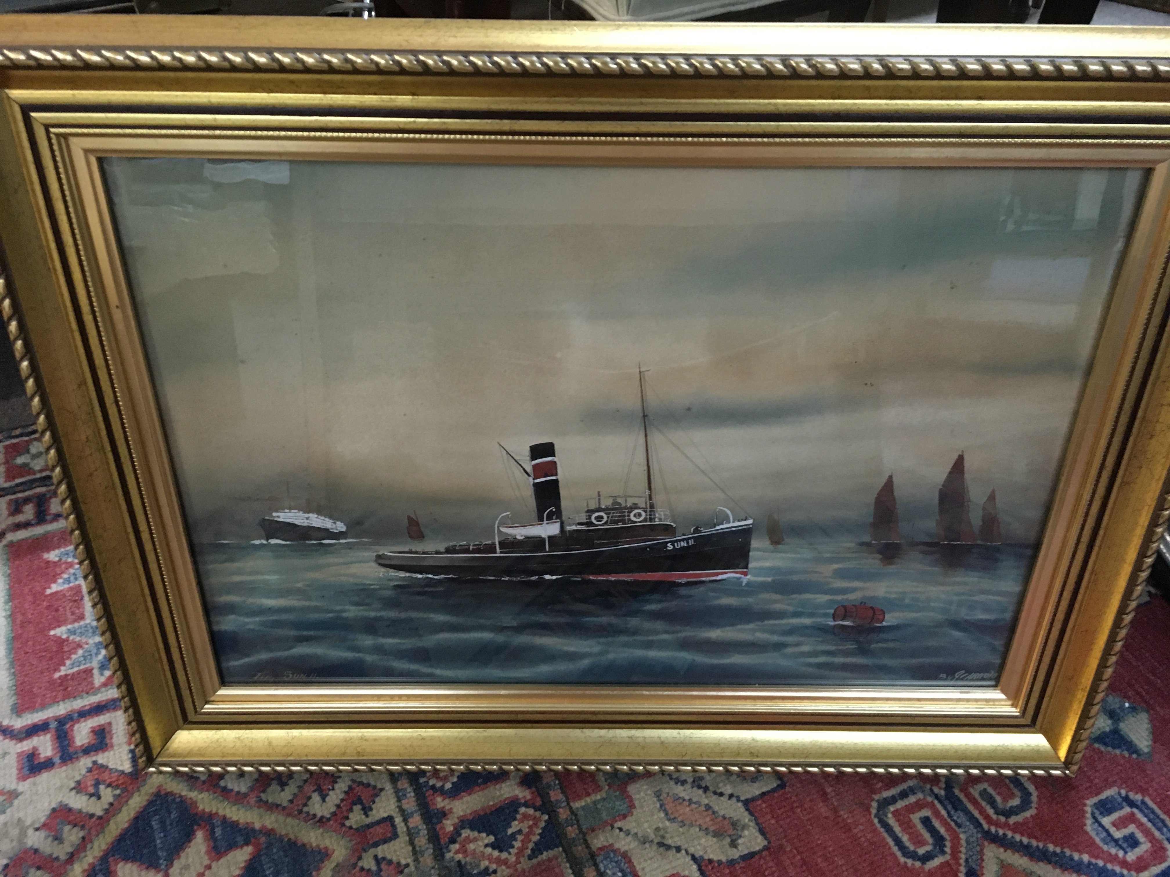 A framed gouache and watercolour study of a tug boat sun II and two coastal view paintings. NO RESERVE