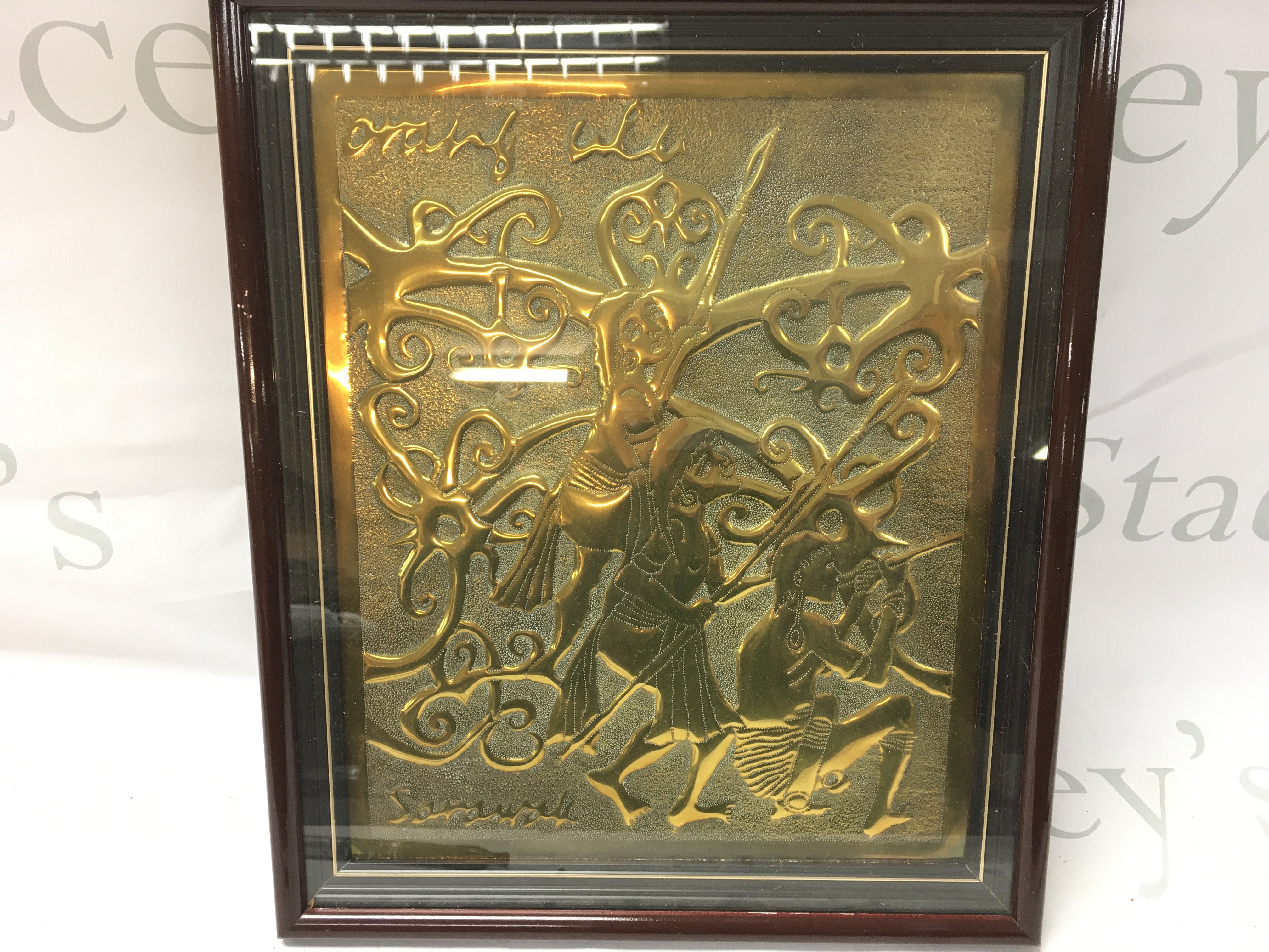 A Framed Indian Brass Picture. Approximate Size 31CM x 36CM.