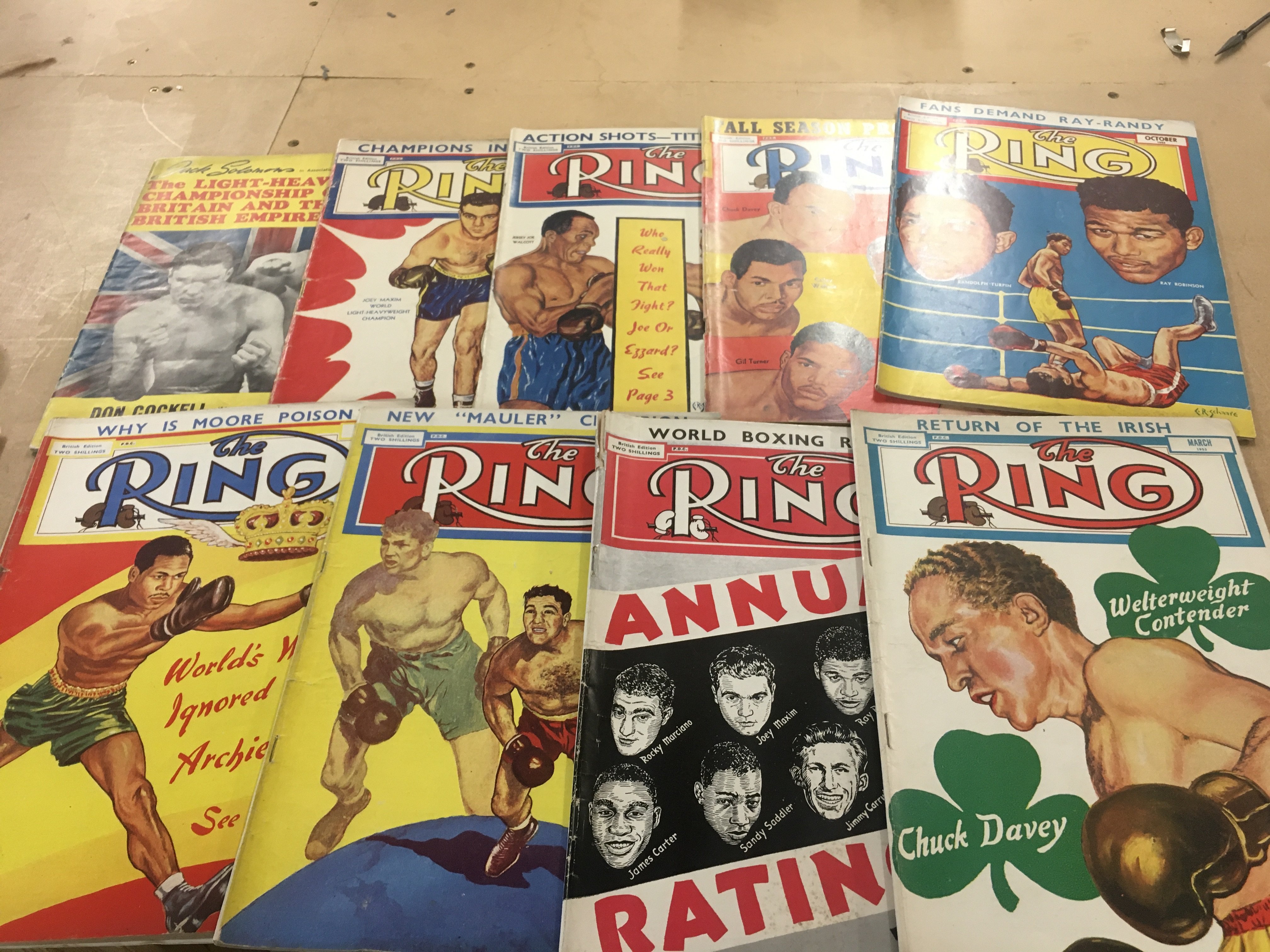 A collection of vintage mid 20th century The Ring boxing magazines . Postage cat b. NO RESERVE