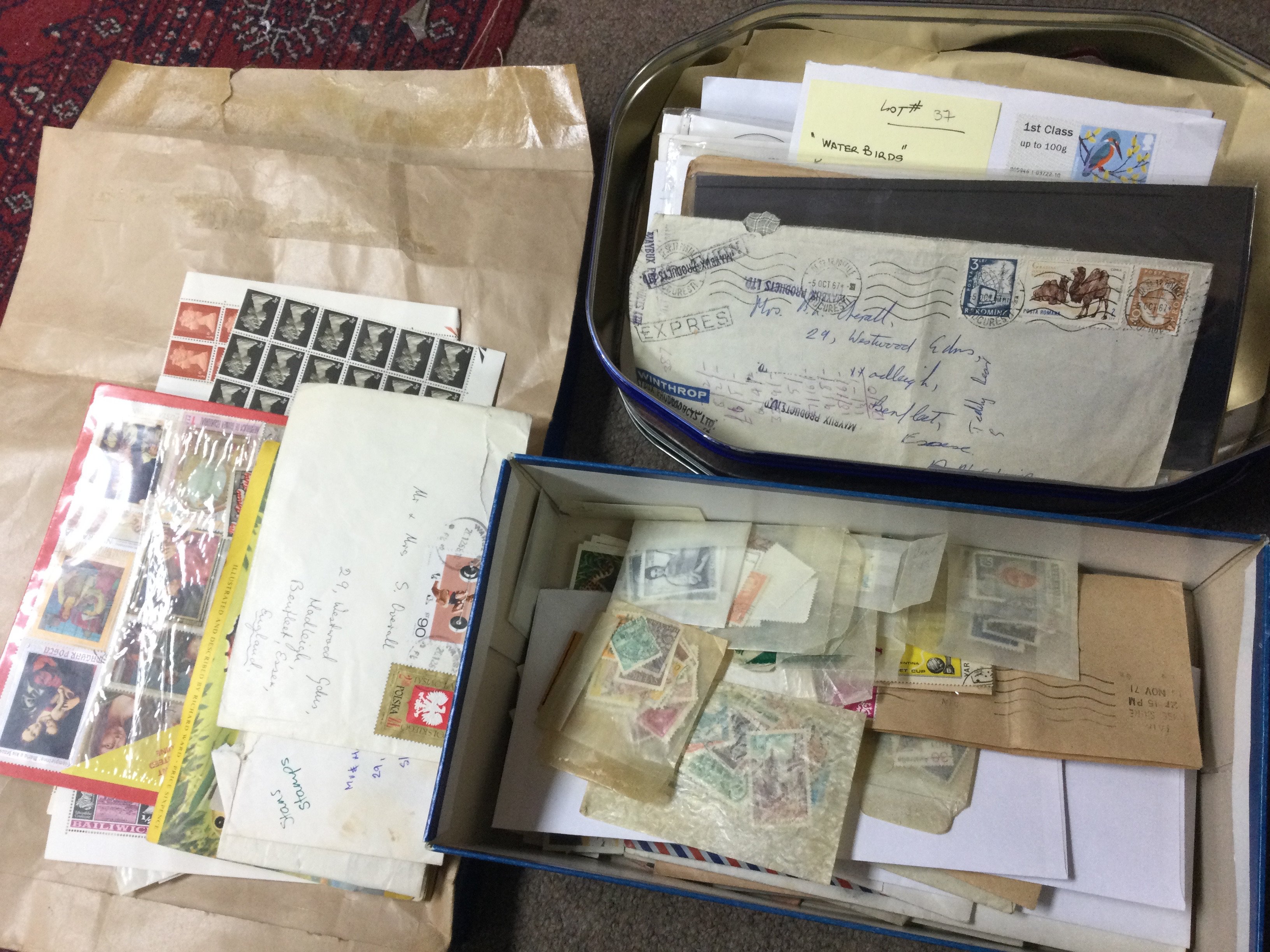 A large collection of used and mint 19th/20th century world stamps including loose and albums from Germany, Egypt , Indore, American etc. this lot cannot be posted