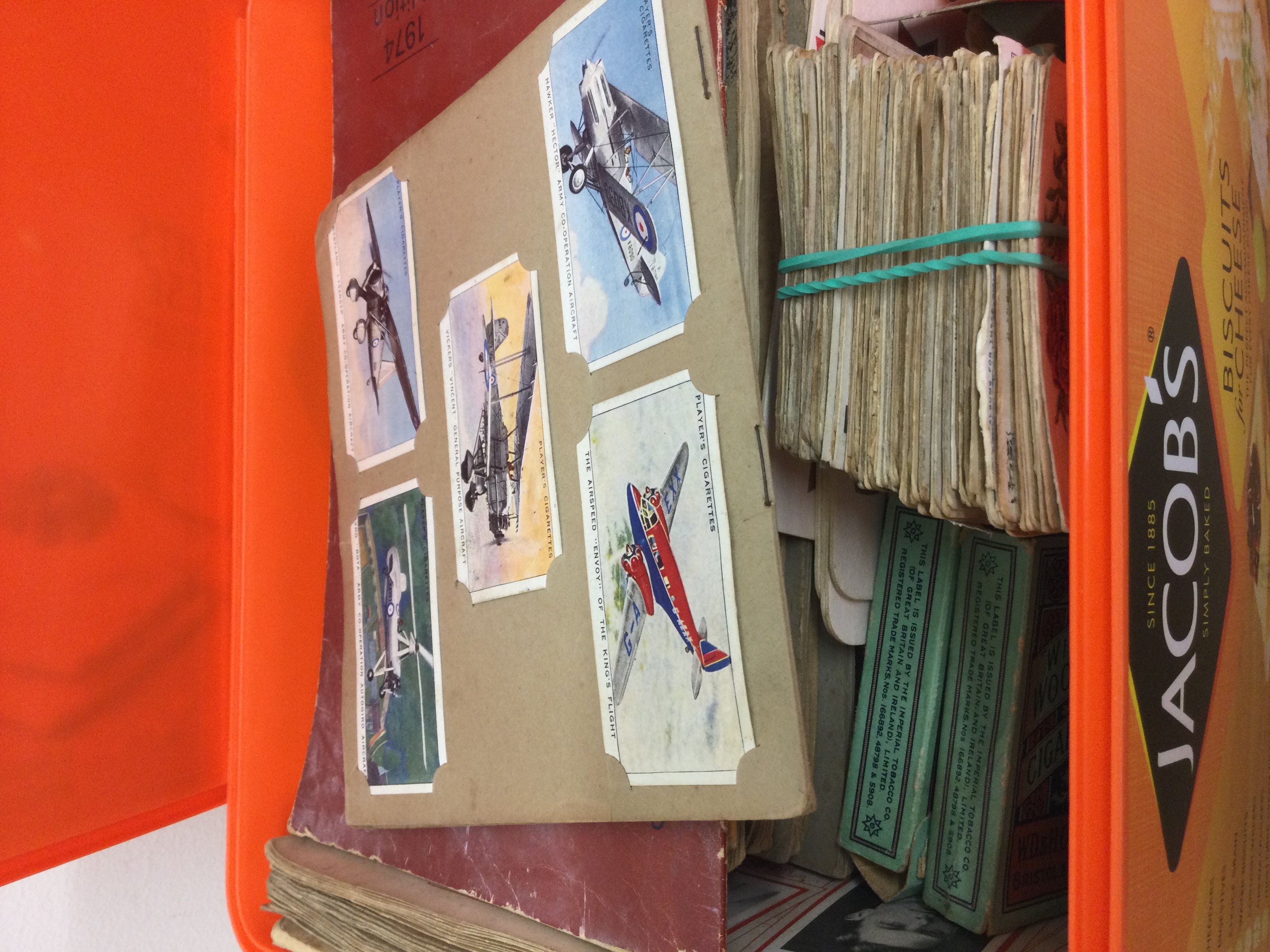 A collection of cigarette cards including Two albums .