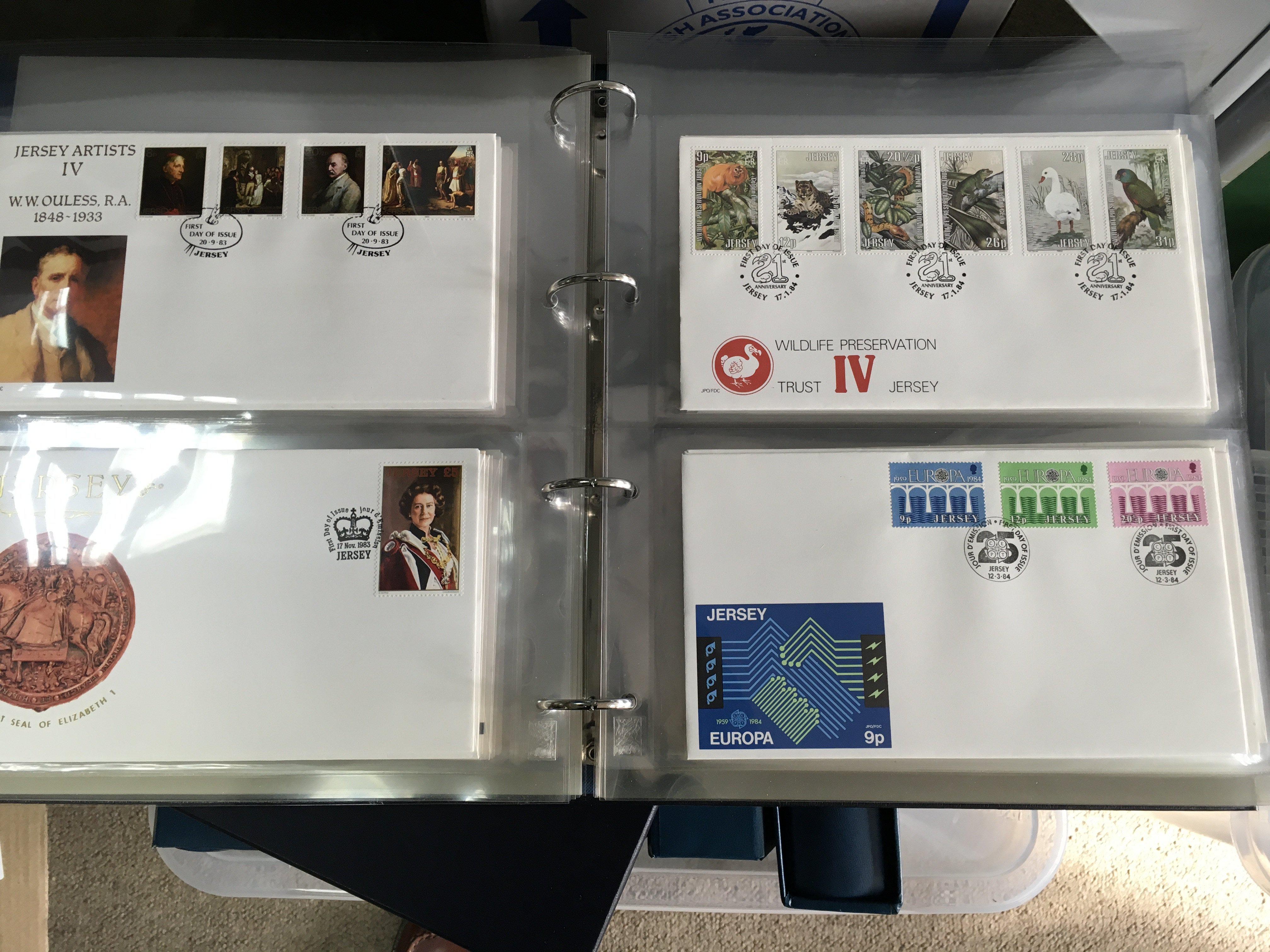 A box containing five albums of jersey first day covers.