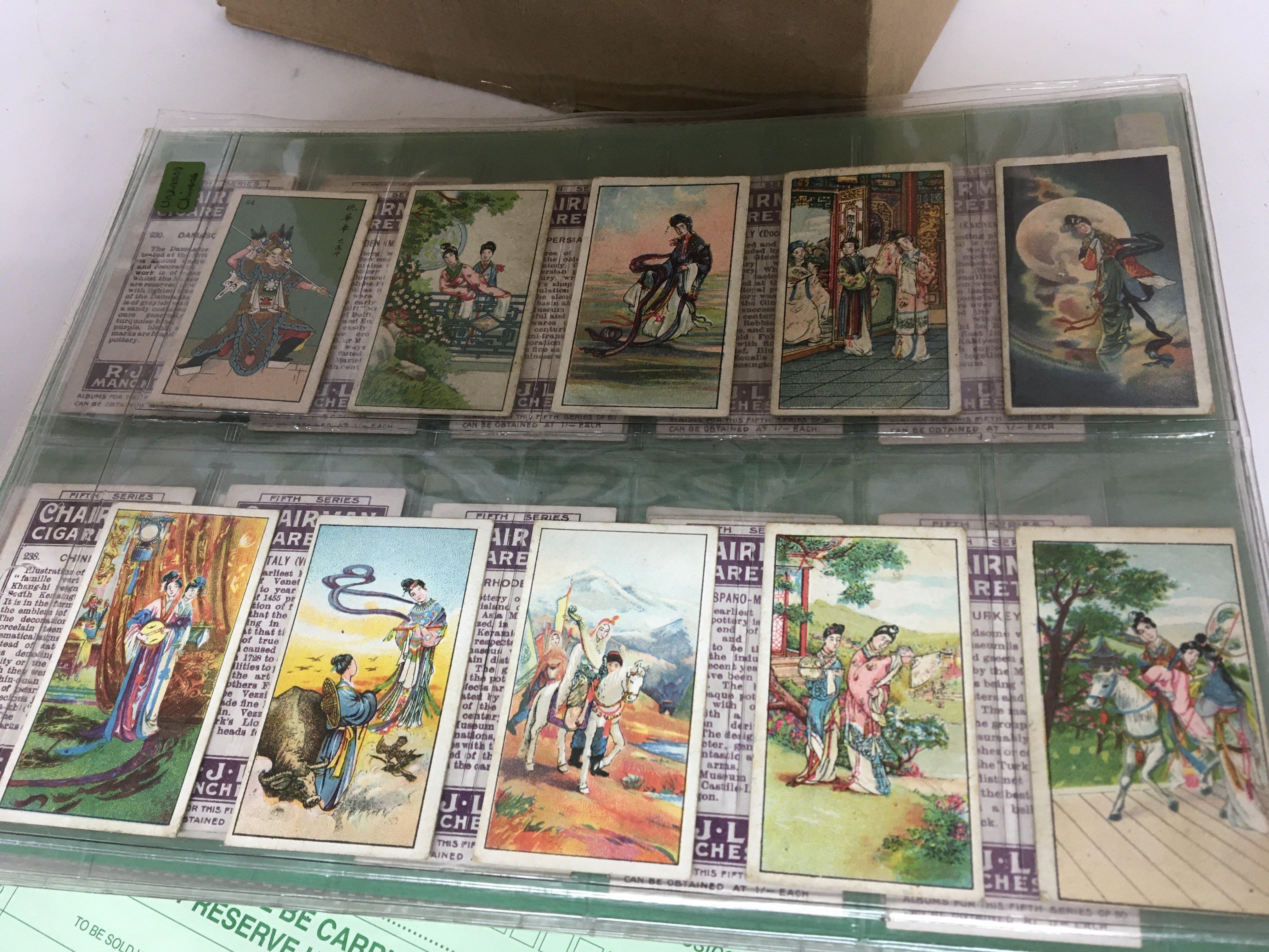 Three Albums containing a good collection of Vintage Cigarette cards and a quantity of loose cigarette cards in plastic sleeves including Chairman and some Chinese cards and many others.