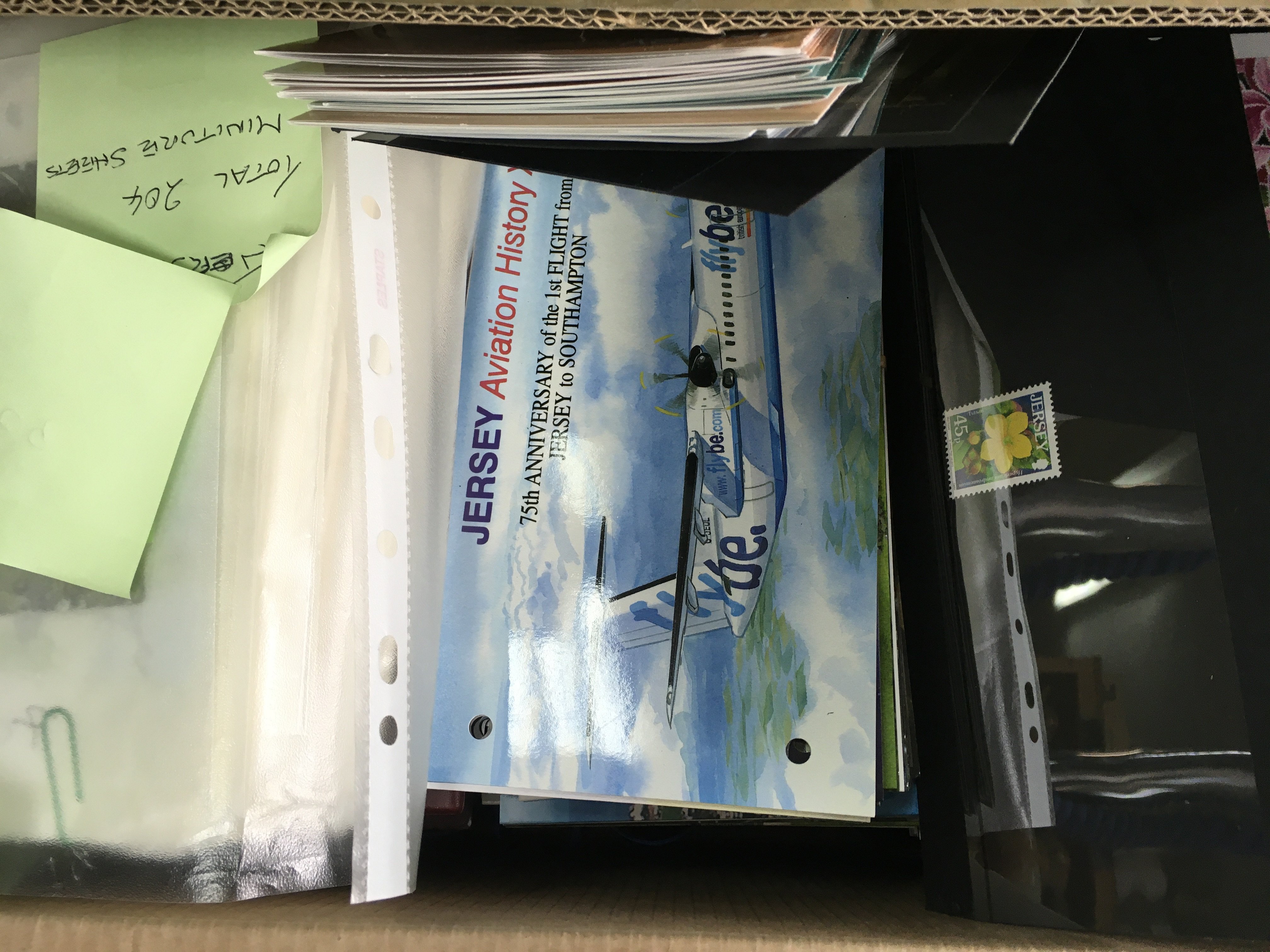 A box containing Jersey presentation packs .