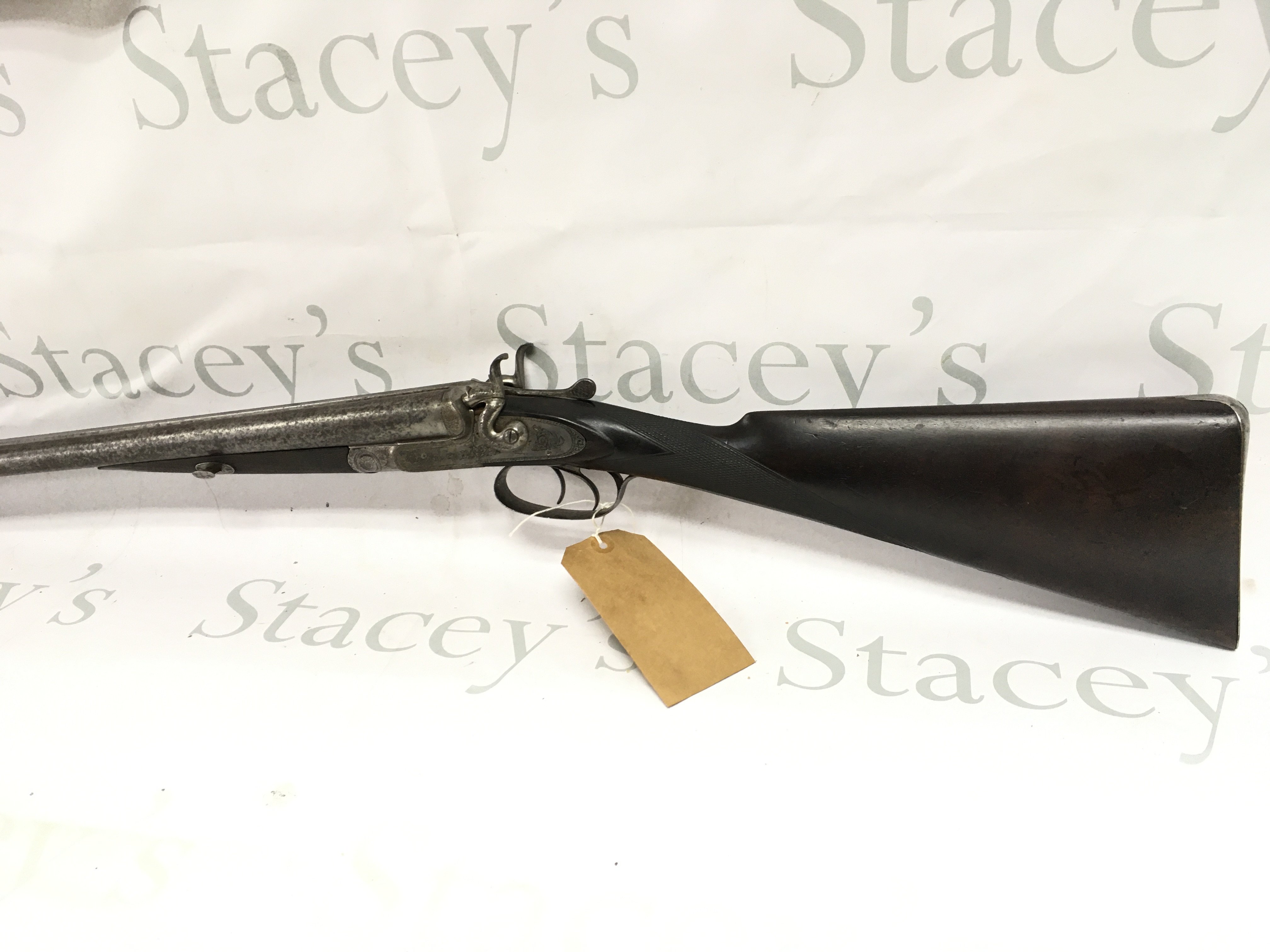 A Jeffery 12 bore side by side hammer shotgun. 30 inch barrel and 46 inches overall. #701 PLEASE NOTE THAT A SHOTGUN LICENSE IS REQUIRED TO PURCHASE THIS ITEM. VIEWING AND COLLECTING IS BY APPOINTMENT ONLY.