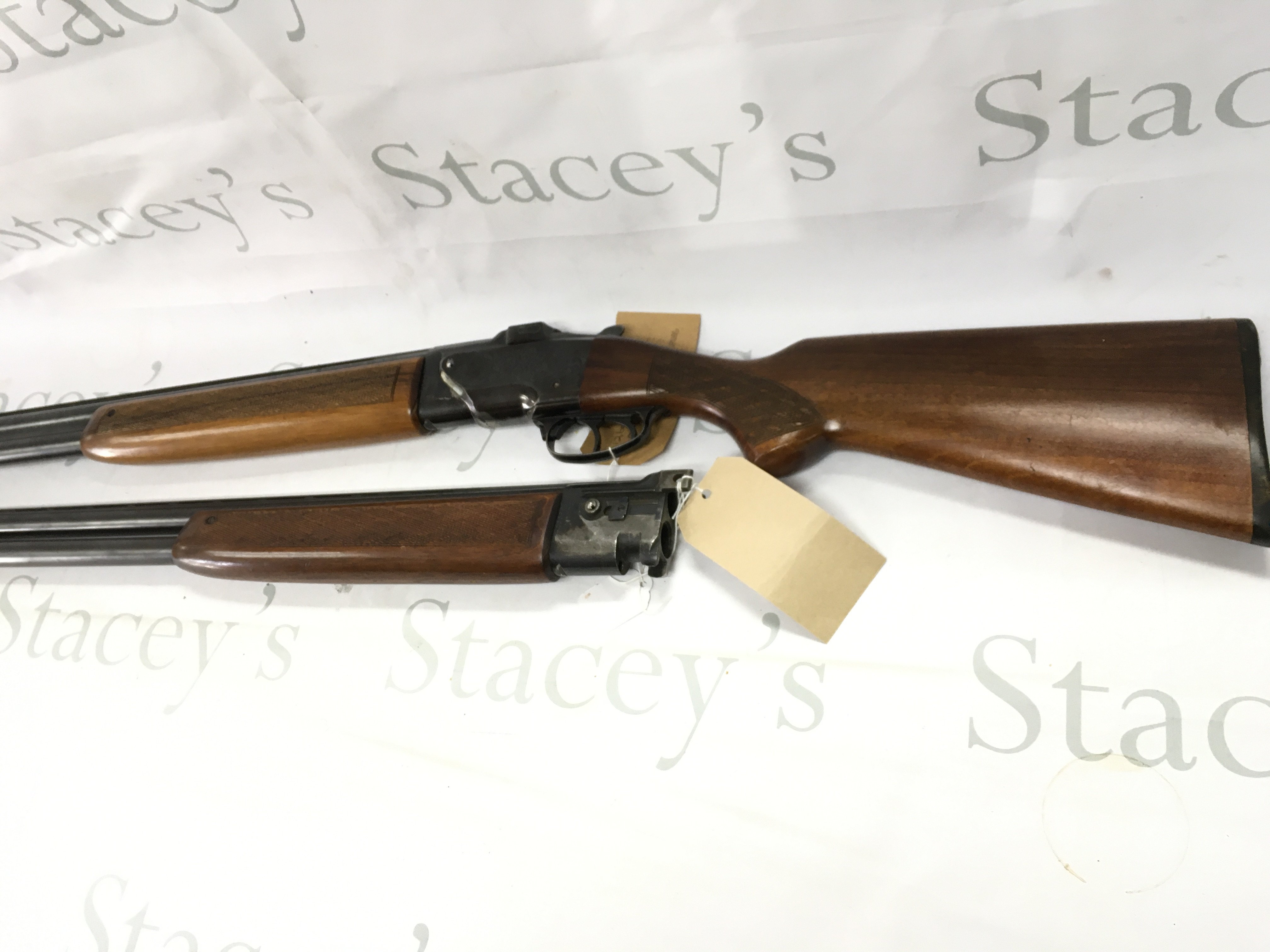A 12bore over and under shot gun walnut stock with double trigger and ejector fixed choke R/H with a spare set of barrels maker Brno model ZH303. Serial number 317773. PLEASE NOTE THAT A SHOTGUN LICENSE IS REQUIRED TO PURCHASE THIS ITEM. VIEWING AND COLLECTING IS BY APPOINTMENT ONLY.