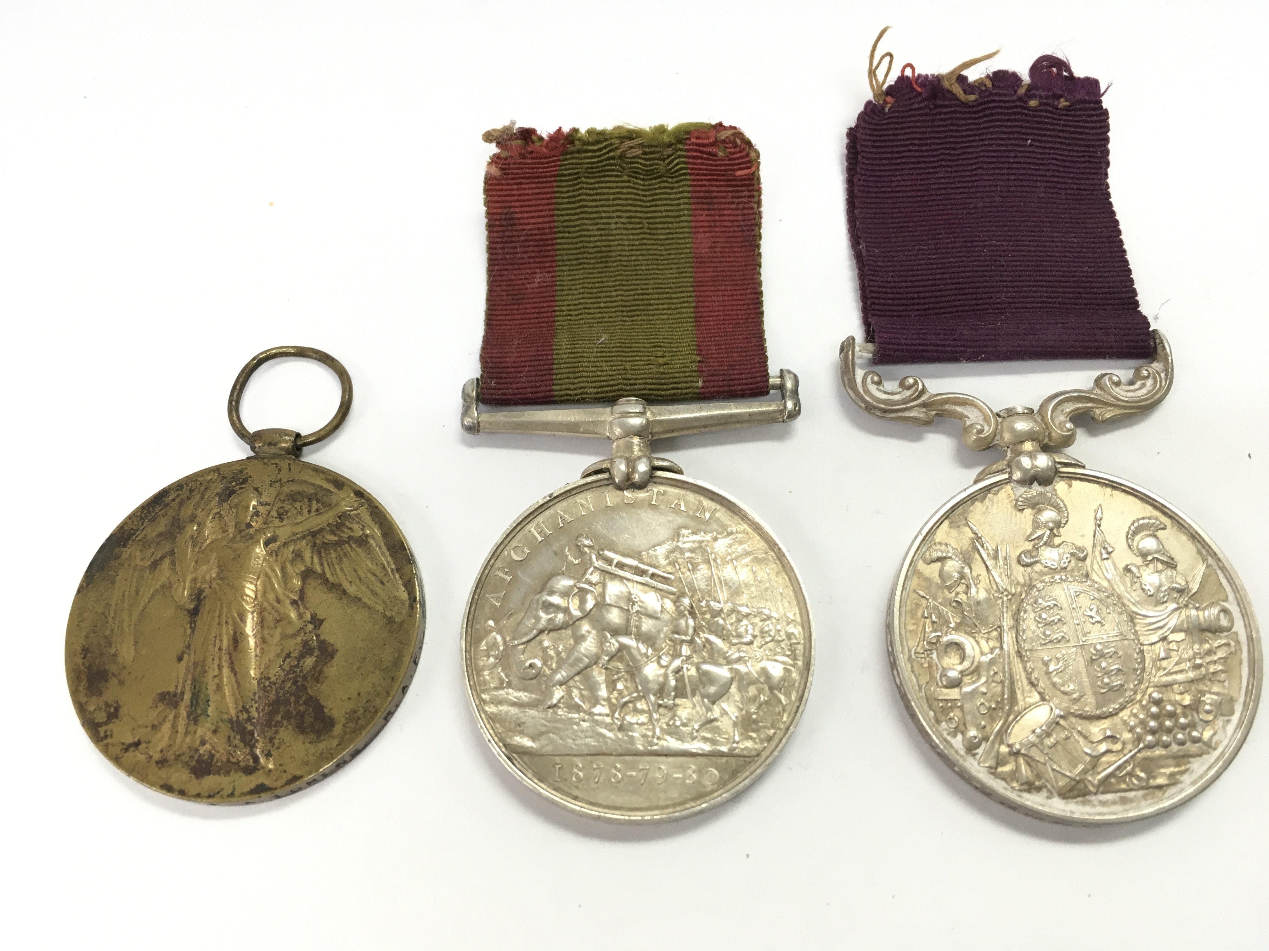Victorian medals including a two medal group- Long Service and Good Conduct medal presented to 8208 B. Wheeler. W. Bodin. R.A, An Afghanistan 1878-79-80 medal presented to 8209 Serg Wheeler Walter Bodin C.by 3rd Bde R.A and a WW1 Victory medal presented to 129694. PTE. 2 .F.A Loring. R.A.F. Postage cat A