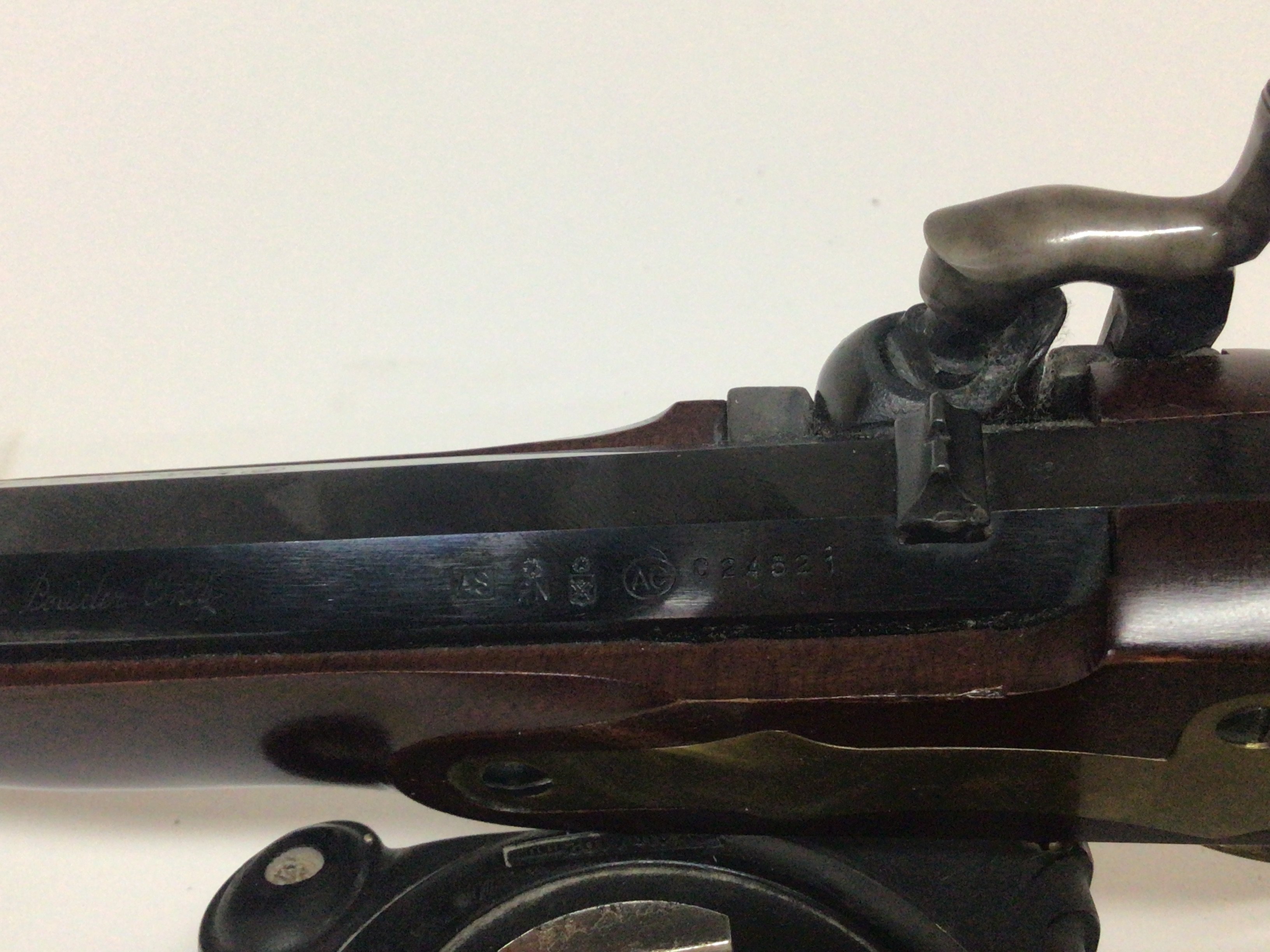 A Modern Precession Black Powder Pistol maker P Bondini Italy with a full length mahogany stock octagonal barrel brass fittings cal 45 serial number C245521 PLEASE NOTE A FIREARM LICENSE IS REQUIRED TO BUY THIS LOT BLACK POWDER. COLLECTION BY APPOINTMENT ONLY- NO RESERVE