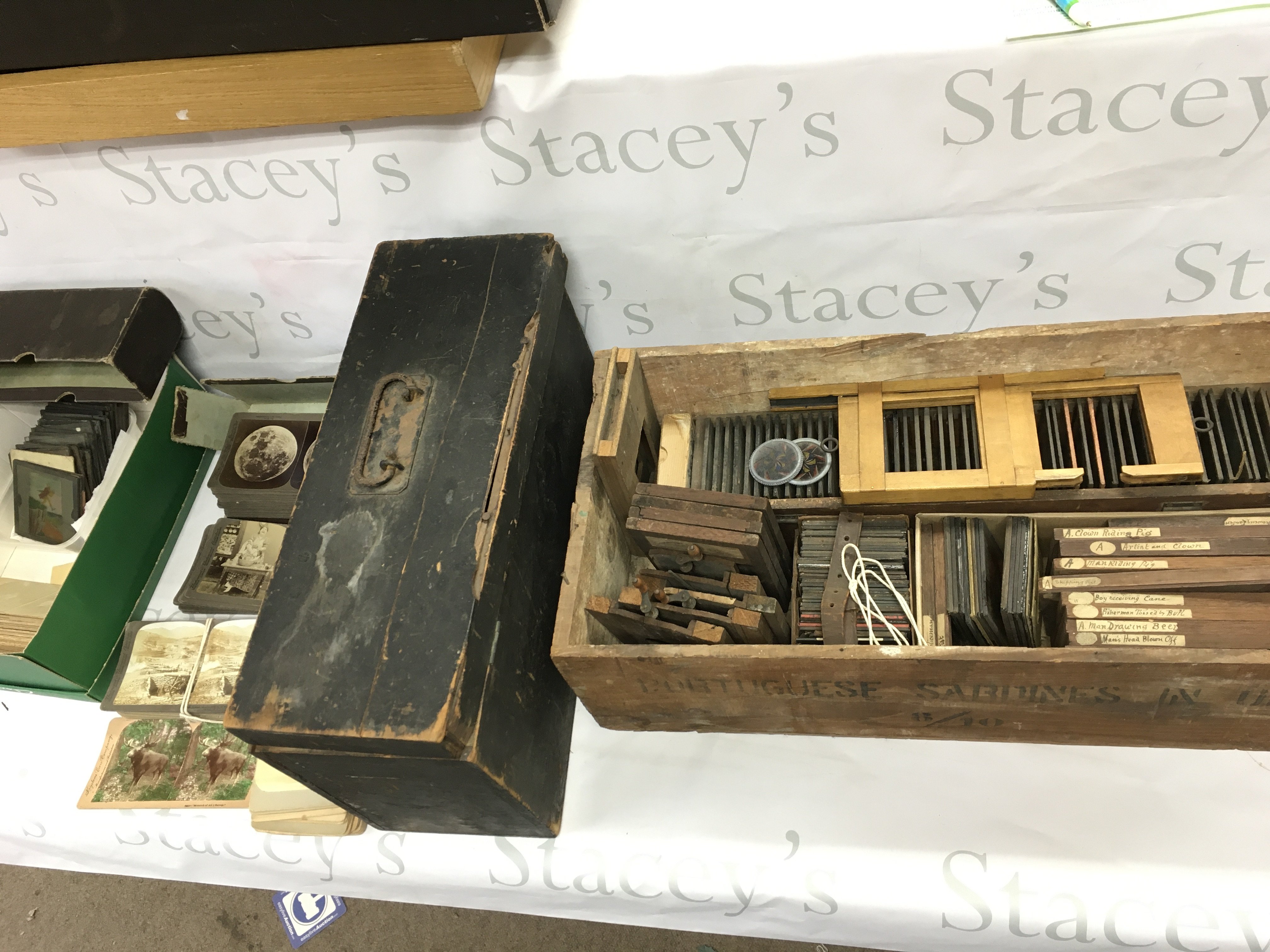 A magic lantern projector and a large number of assorted slides.