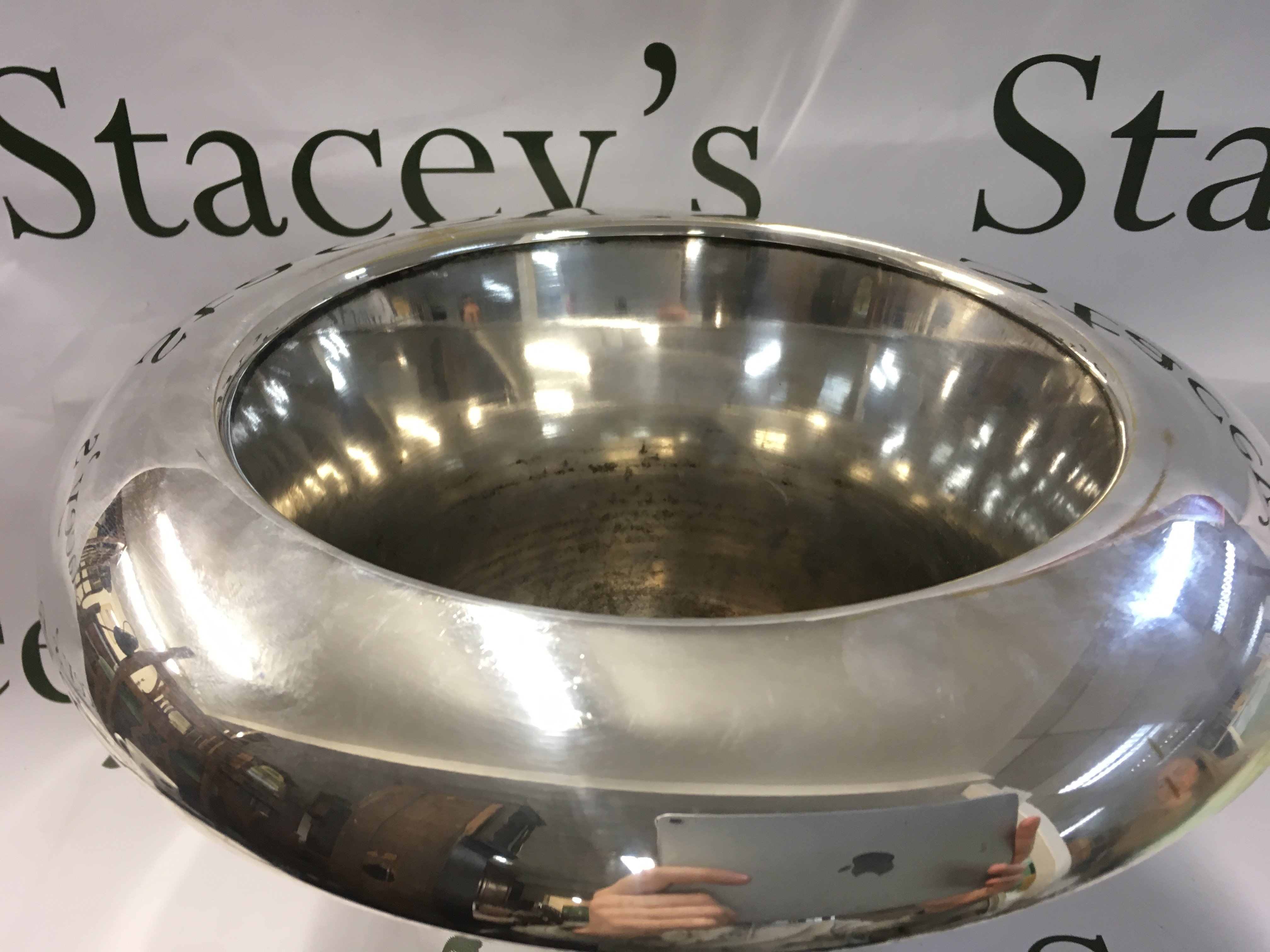 A 1980s silver plated top hat wine cooler, 23.5cm tall , 30cm wide approximately . Postage category C NO RESERVE