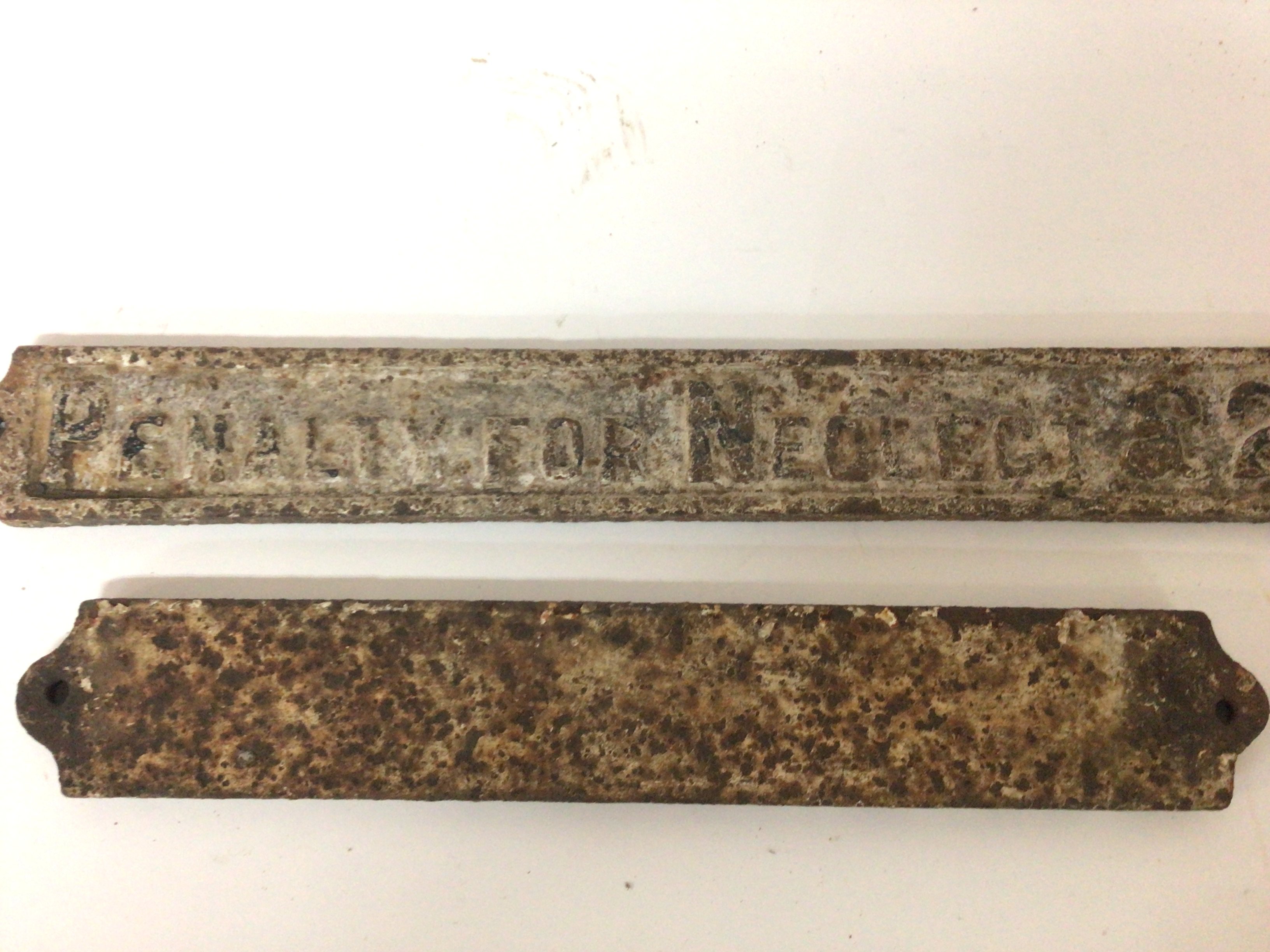 Two Genuine Railway cast iron railway gate sings Shut the gate and Penalty for Neglect &#20132660832 from a field crossing gate from the Scarborough York line near Kirkham Abbey. The signs possibly of North Eastern Railway origin. (2) length 52cm NO RESERVE