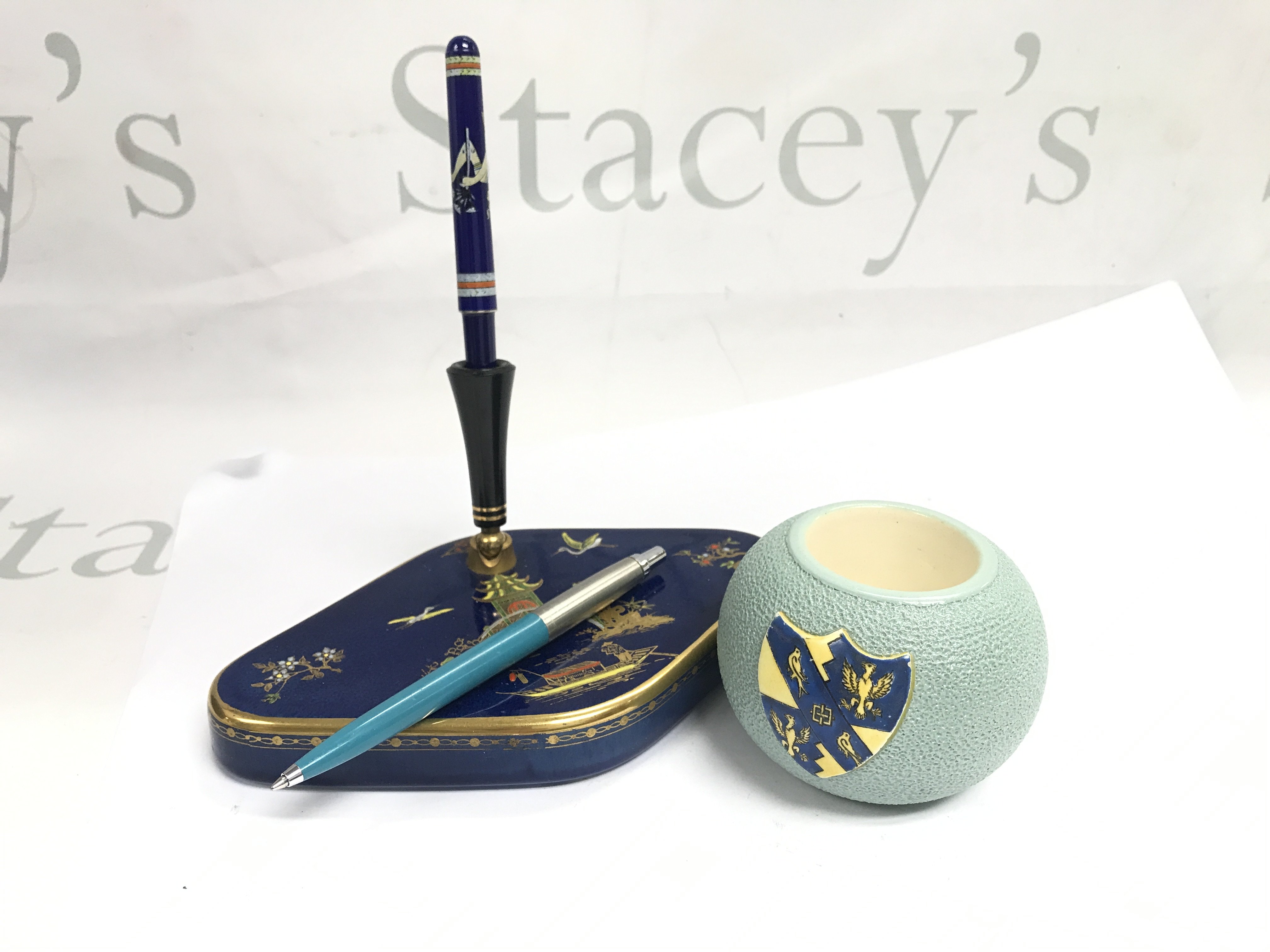 A Rare ceramic pen holder by Parker, ceramic Carlton Ware match striker. Parker Pen. This lot cannot be posted