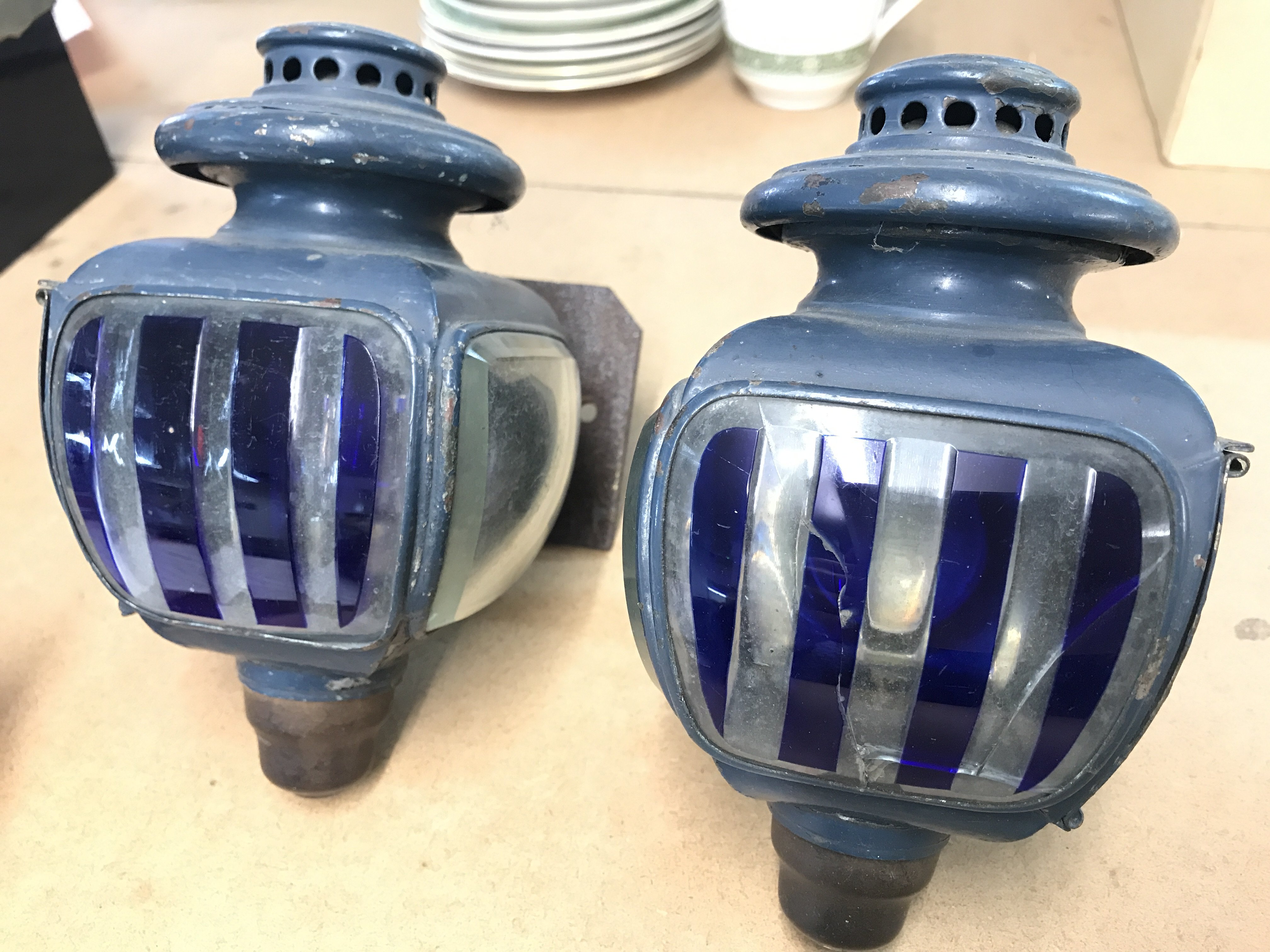 Early blue and white glass opera lamps for use on parking carriages outside at nights. This lot cannot be posted