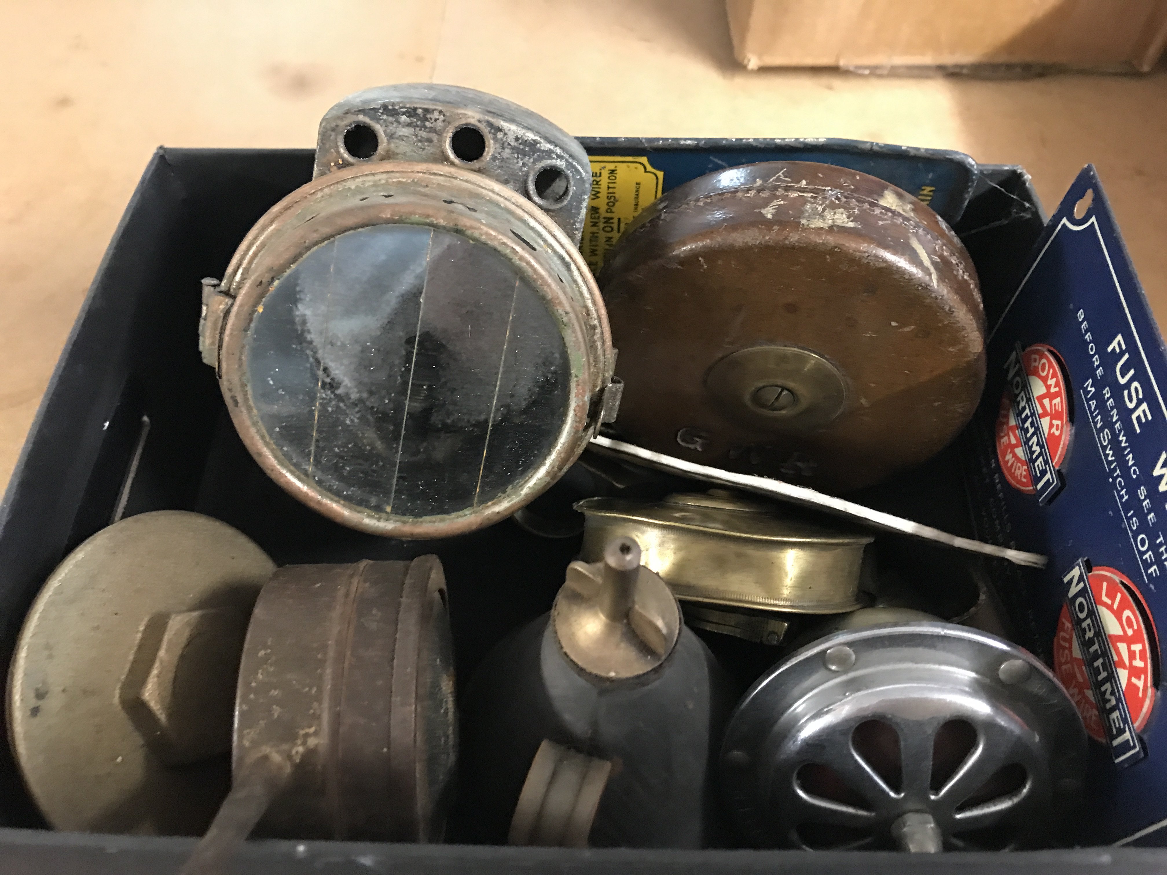A small unusual early bike lamp, early brass tape measure impressed The Property of the Automobile association and various other items including GWR tape measure. This lot cannot be posted