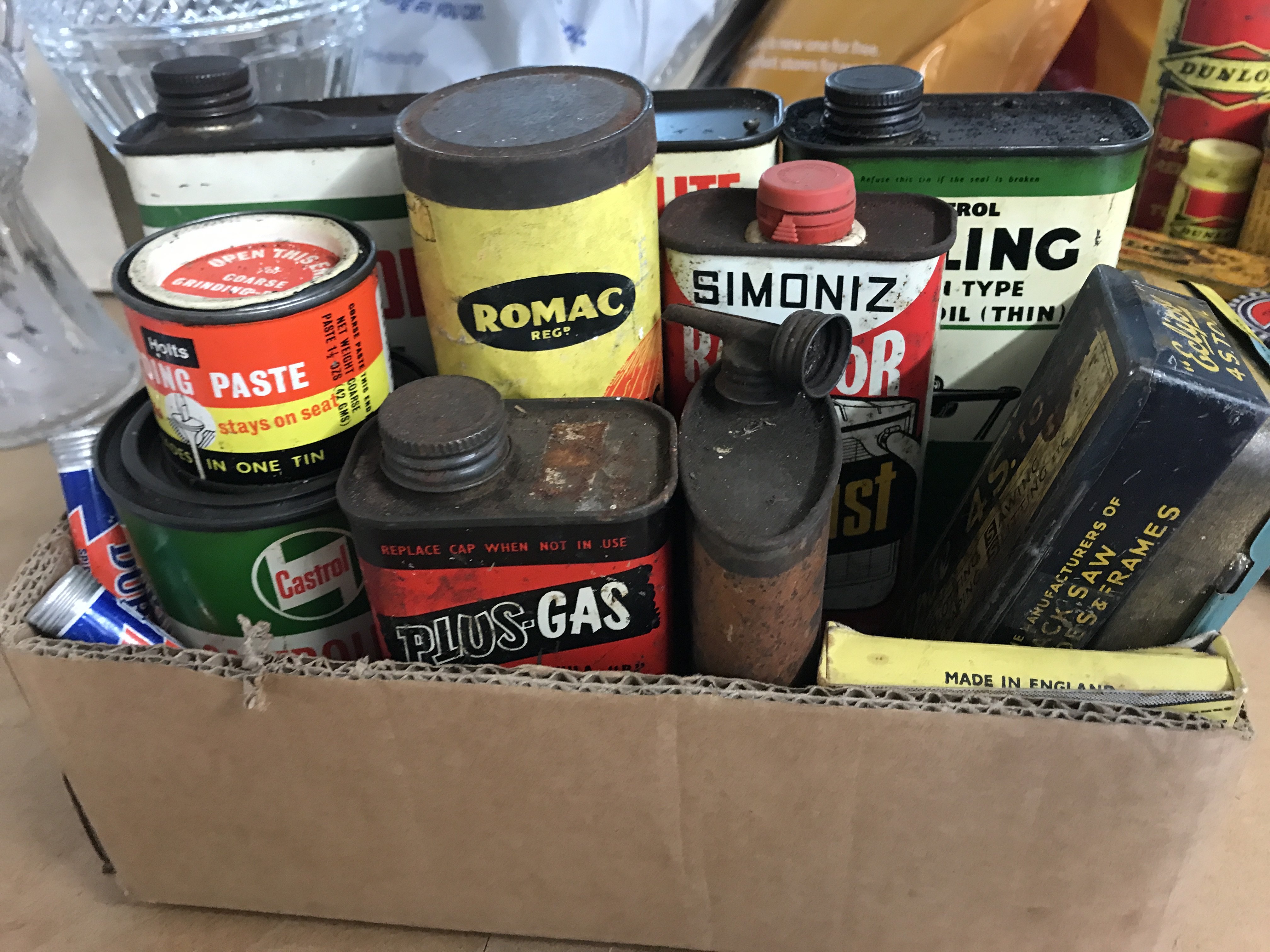 A collection of various vintage motoring tins including Plus gas, Castrol grease, anti rust etc