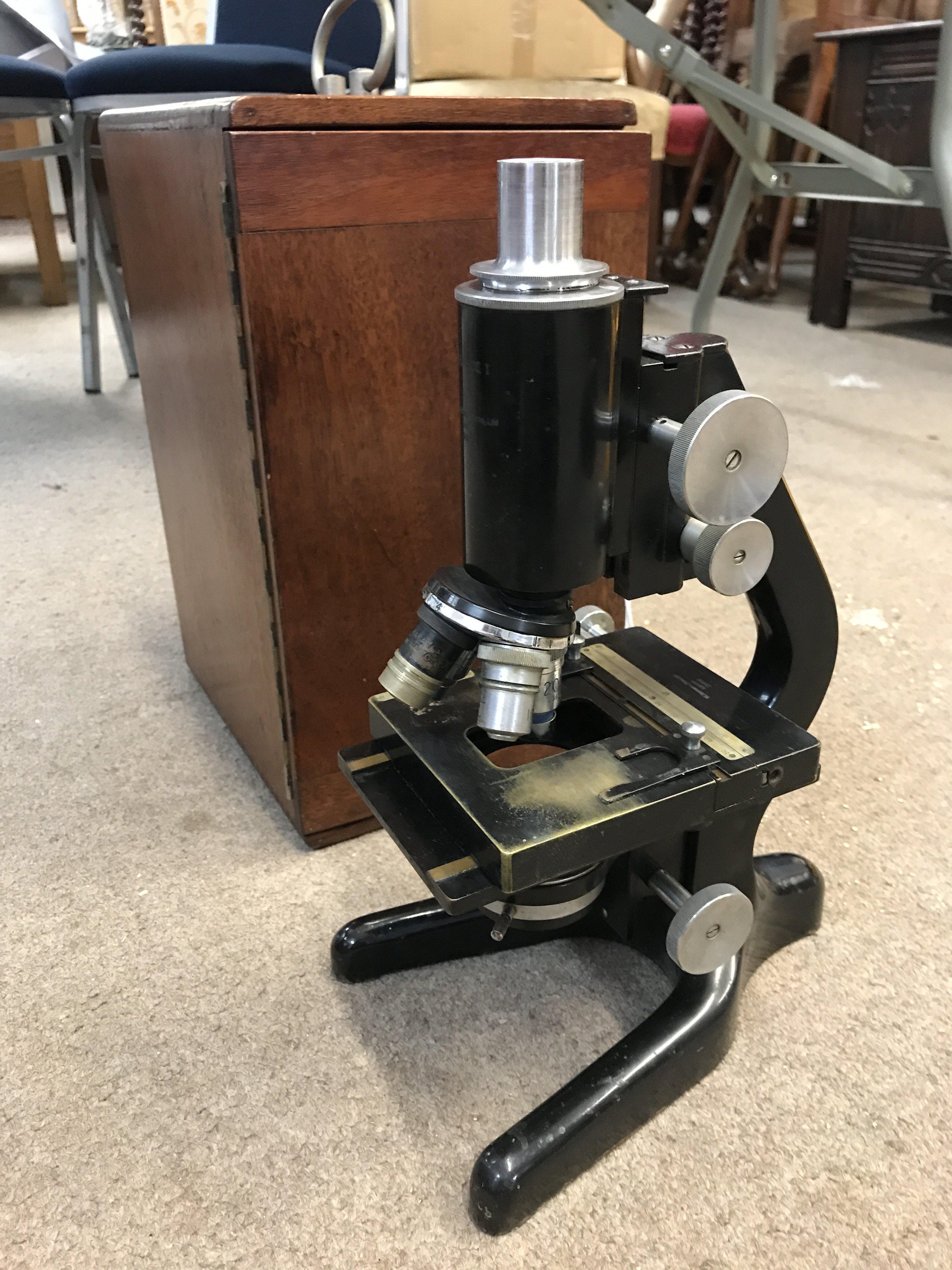 A W.Watson & Sons microscope with case. This lot cannot be posted