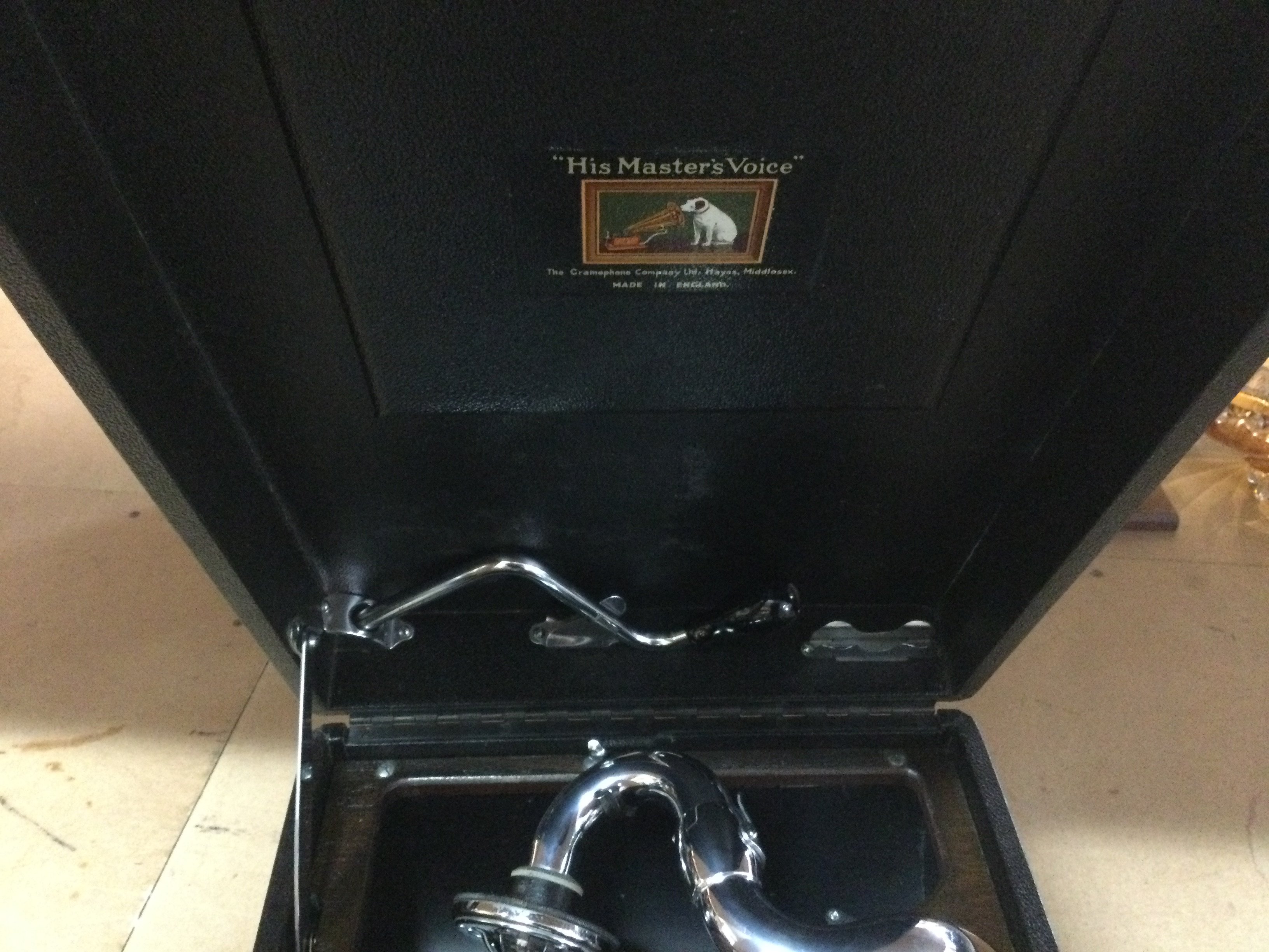 A HMV table top gramophone.