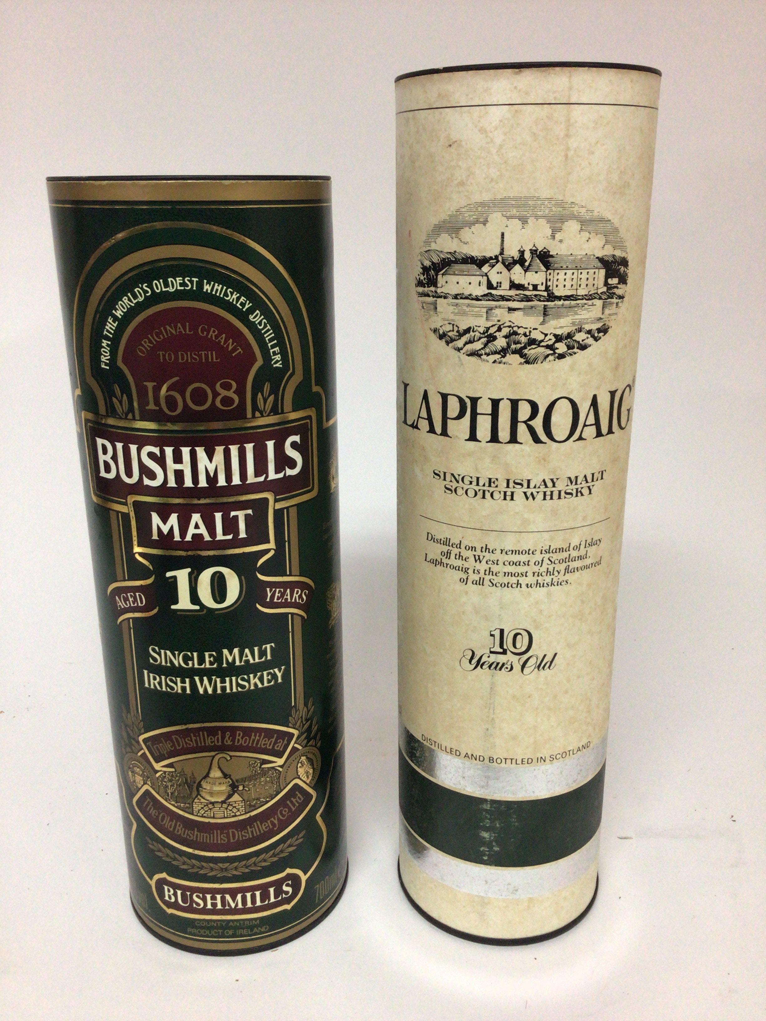 A bottle of single Malt 10year old Irish whiskey Bushmills and a bottle of Laphroaig 10year single Malt pre Royal warranty both 70cl bottles. (2)