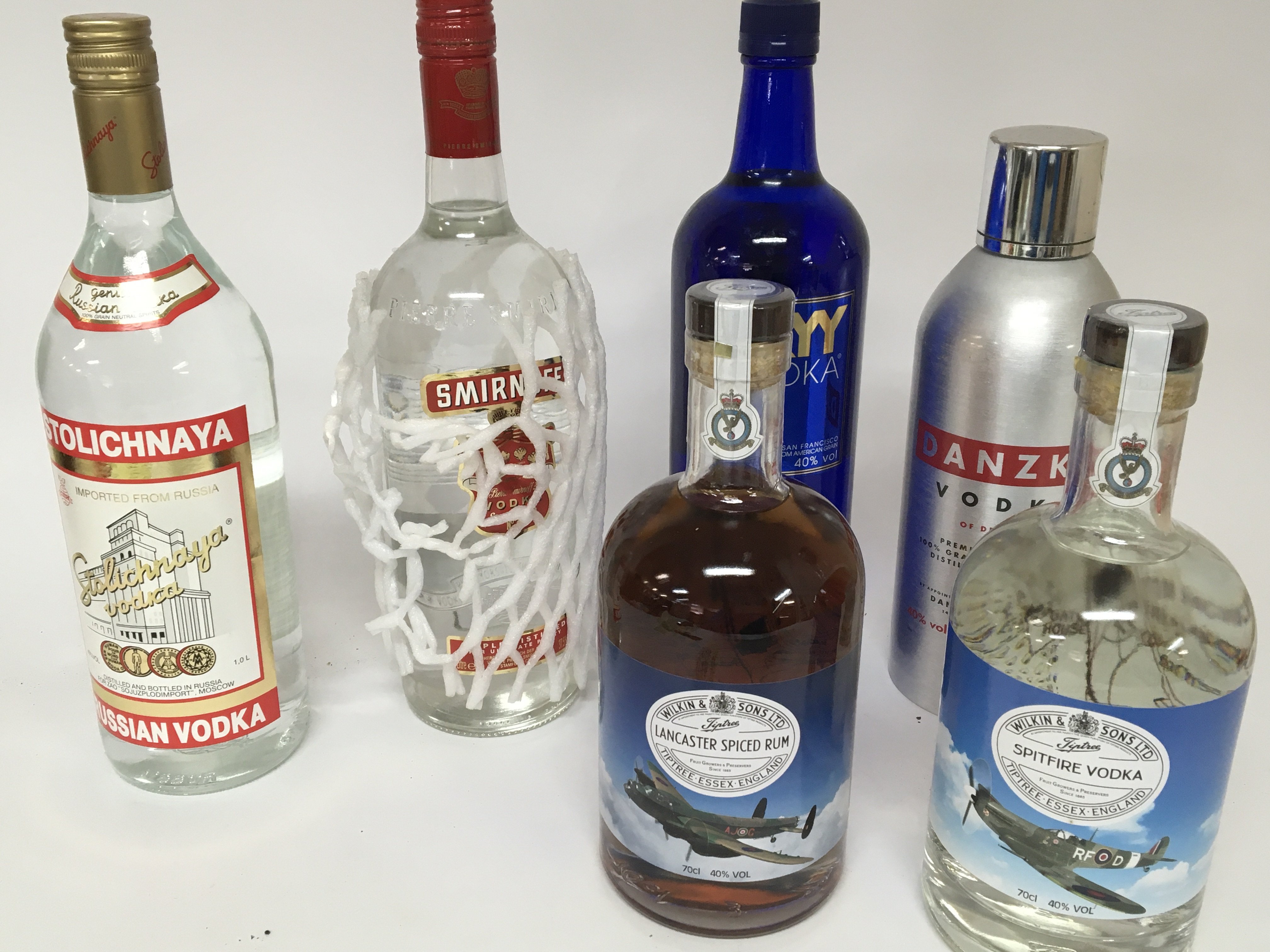 Two bottles of Wilkinson spirits Spitfire Vodka and Lancaster Spiced Rum and four other bottles of Vodka