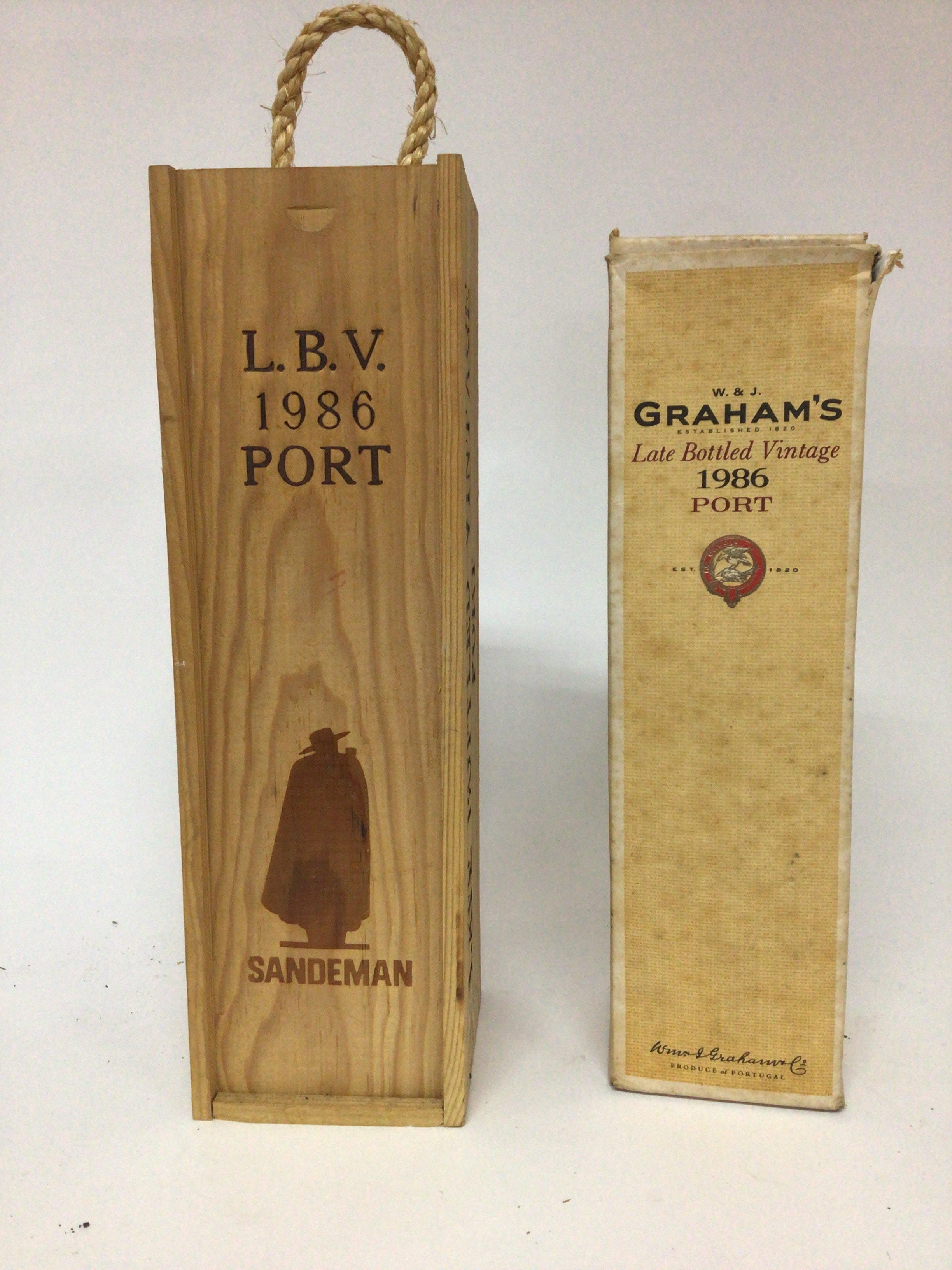 Two bottles of Vintage Port 1986 Grahams and Sandeman LBV in a wooden box (2)