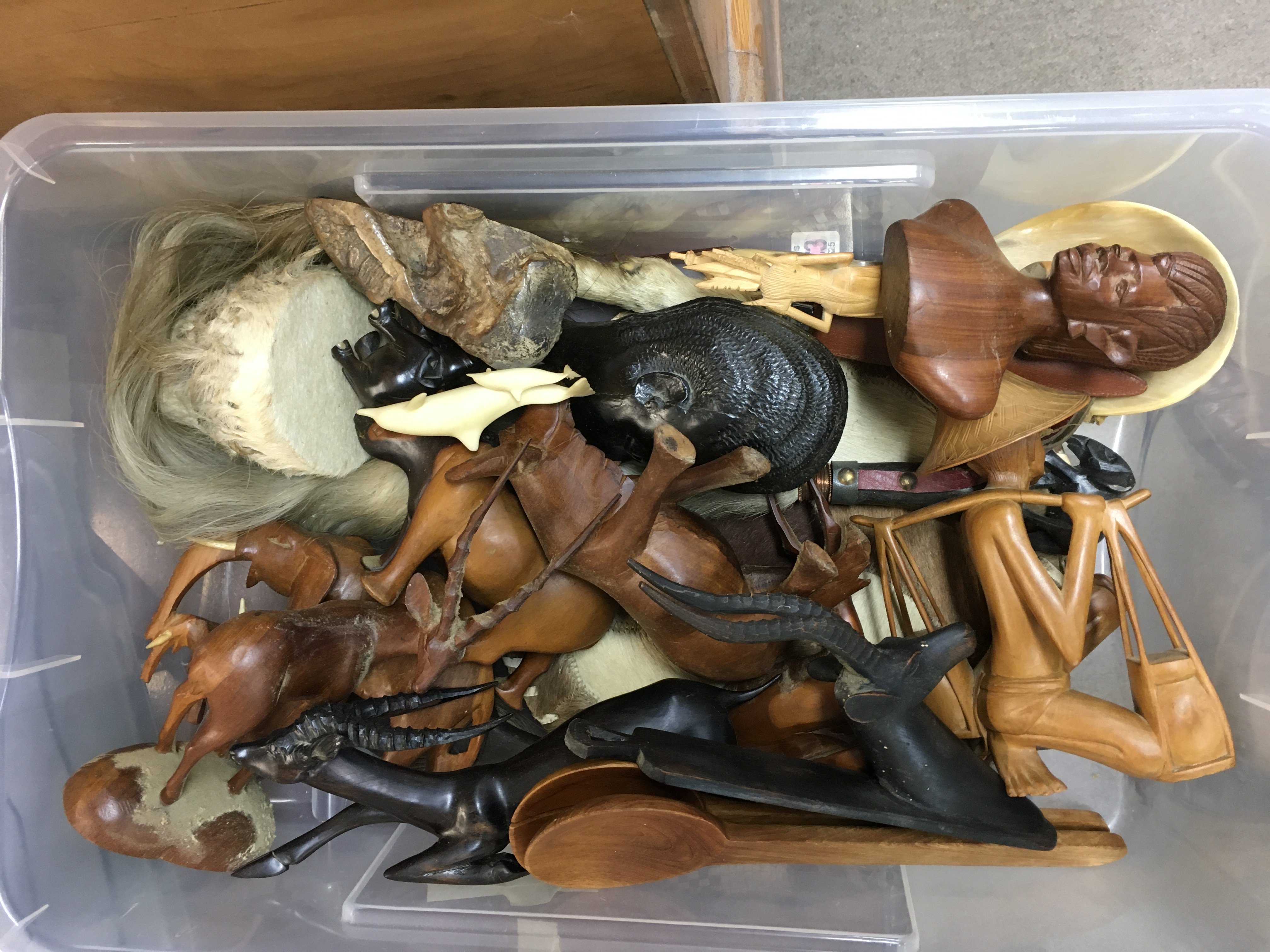 A Collection of carved hardwood carvings .