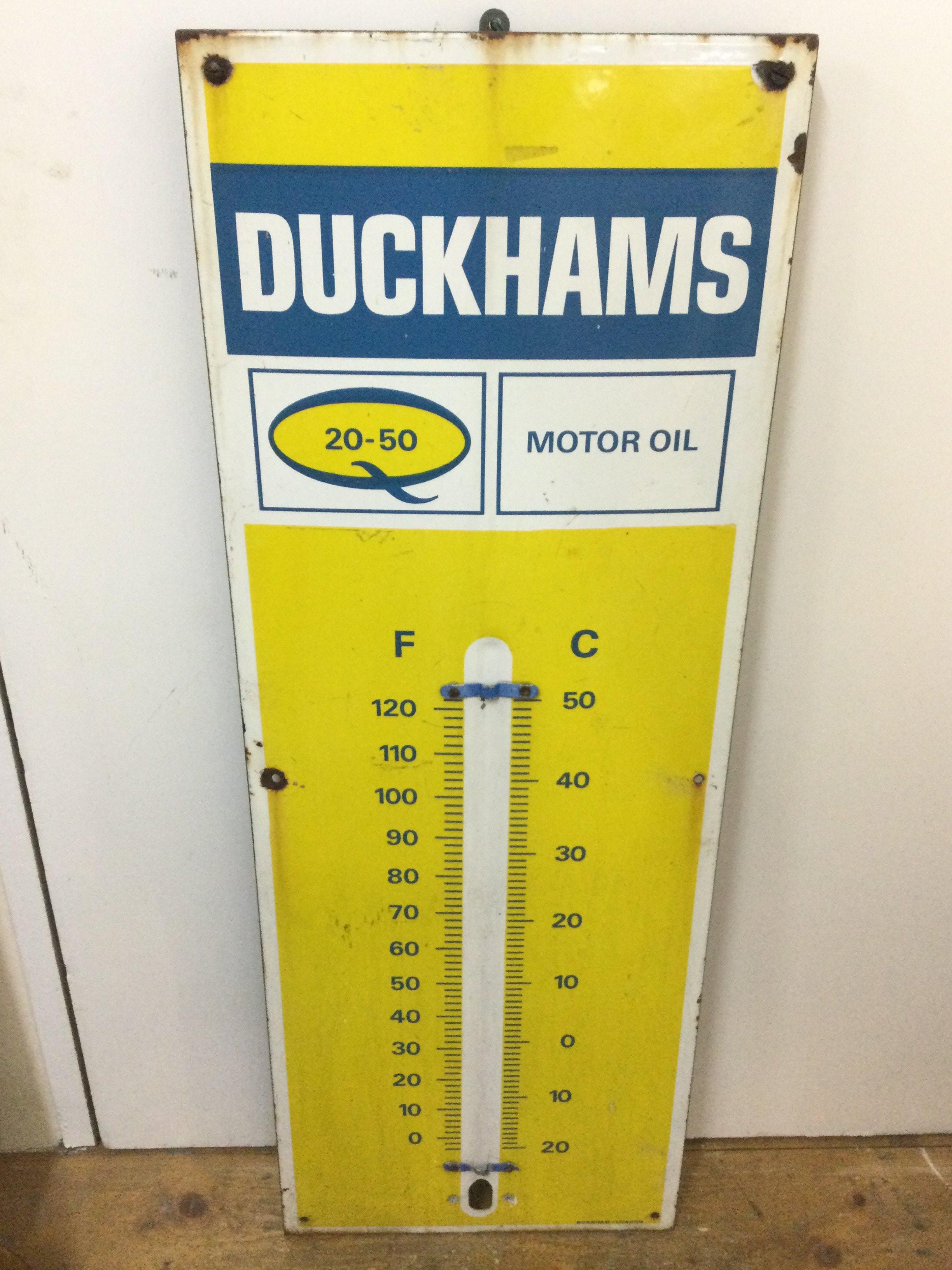 A rare vintage Duckhams Motor Oil Thermometer Enamel Sign, 33cm wide , 92cm tall.
