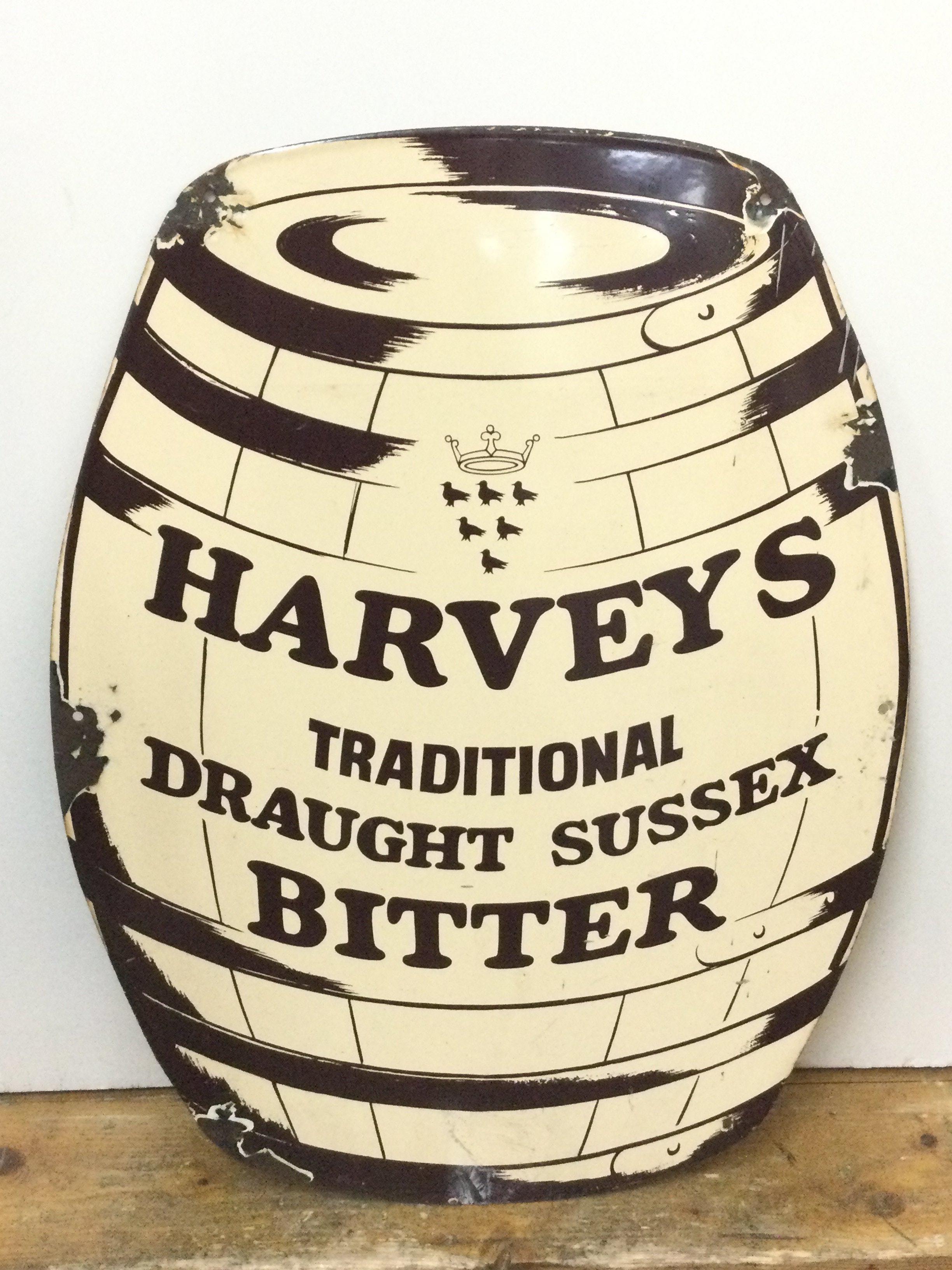 A vintage Harveys Traditional Draught Sussex Bitter enamel advertising sign , 47cm wide 62cm tall