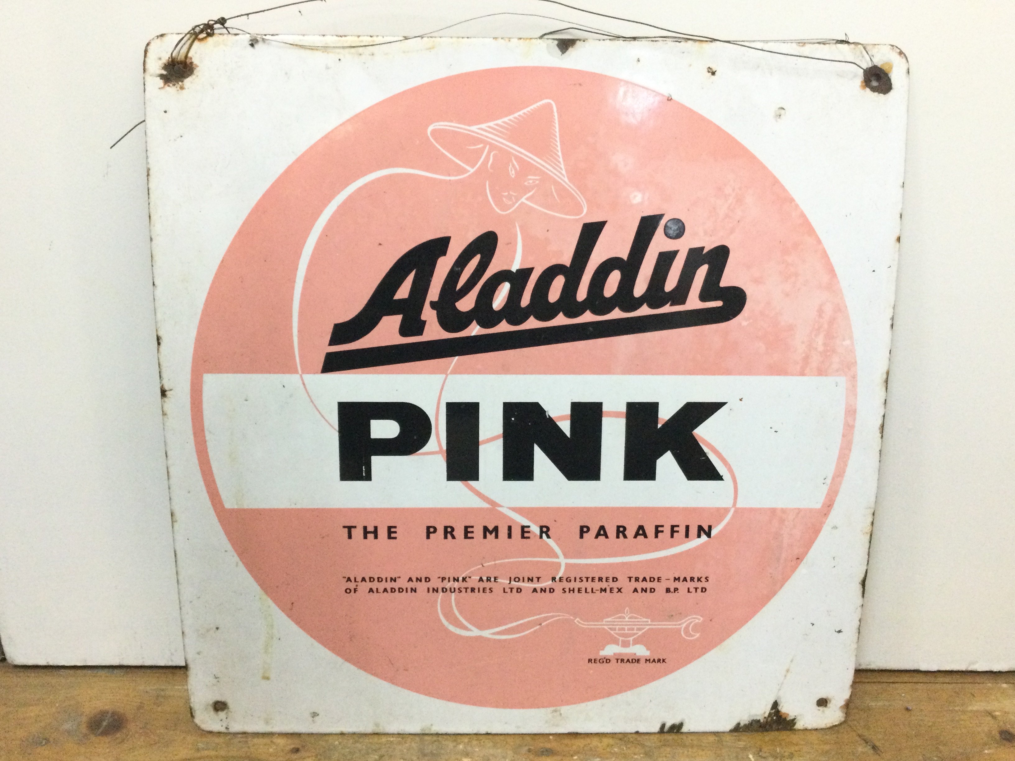 A vintage Aladdin Pink, the Premier Paraffin enamel sign, dimensions 42x42cm