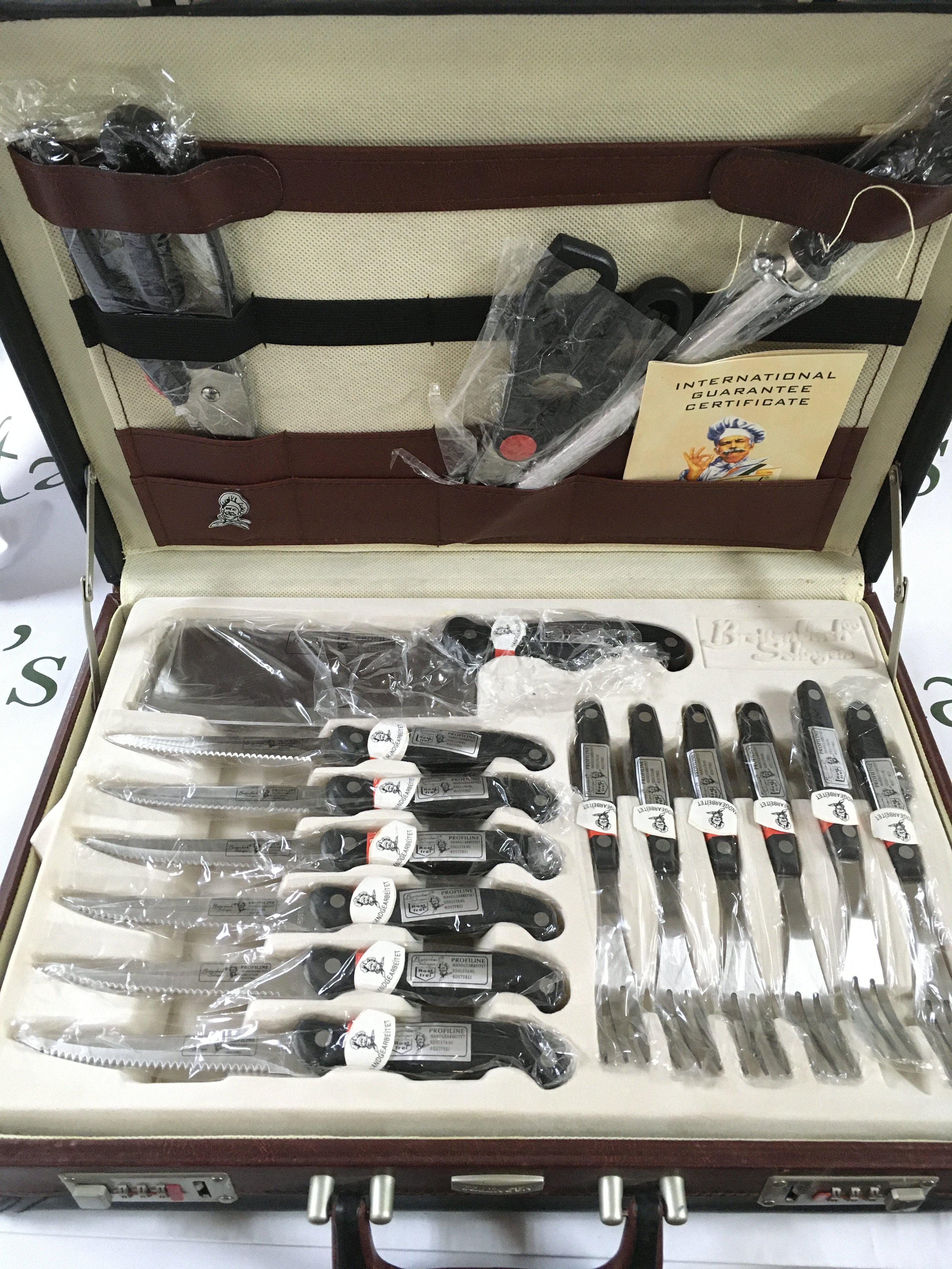 A Soligen canteen case of knifes and steak knives . Postage category C