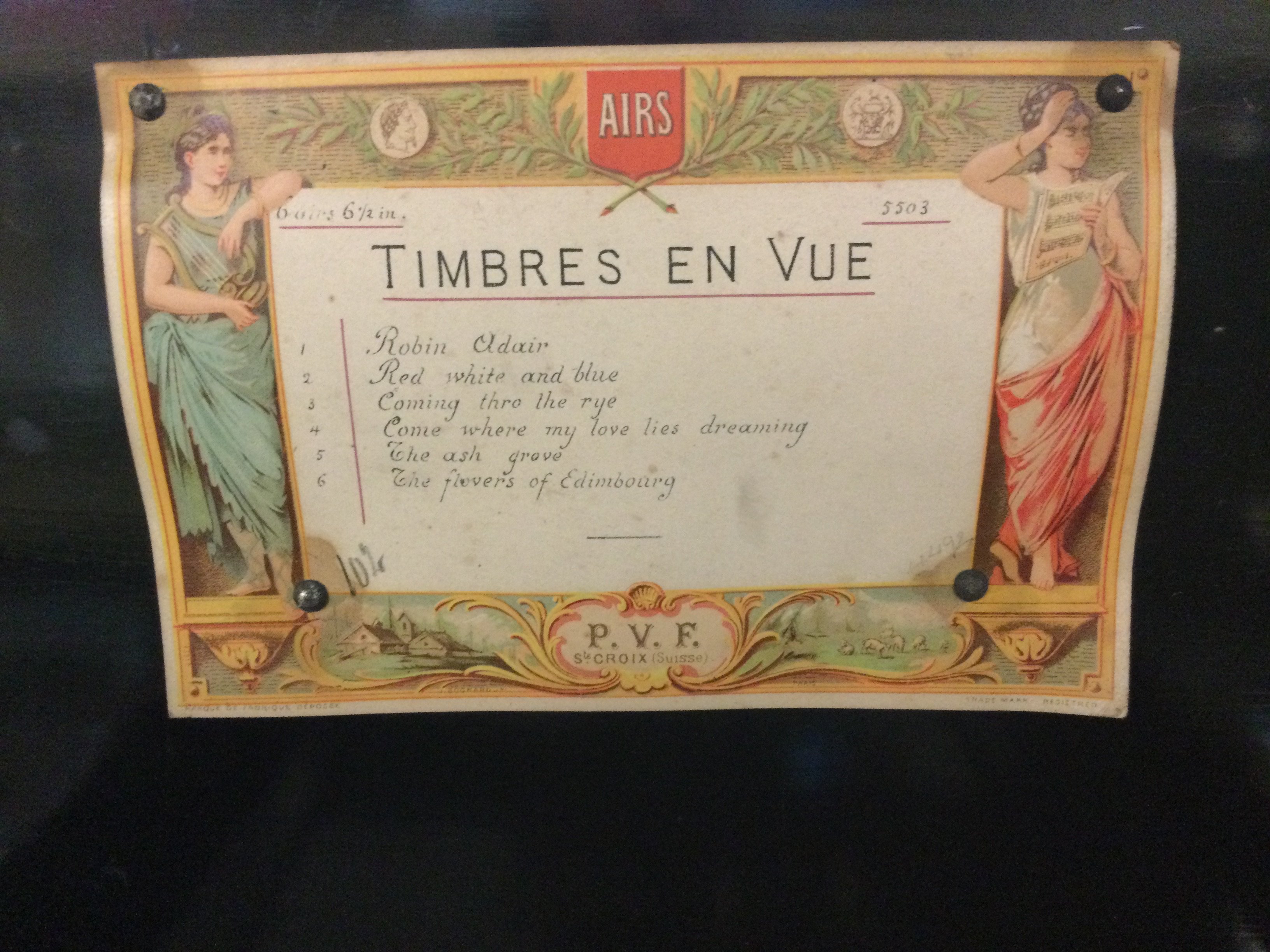 A Victorian musical box six airs with Chinese figures striking bells .