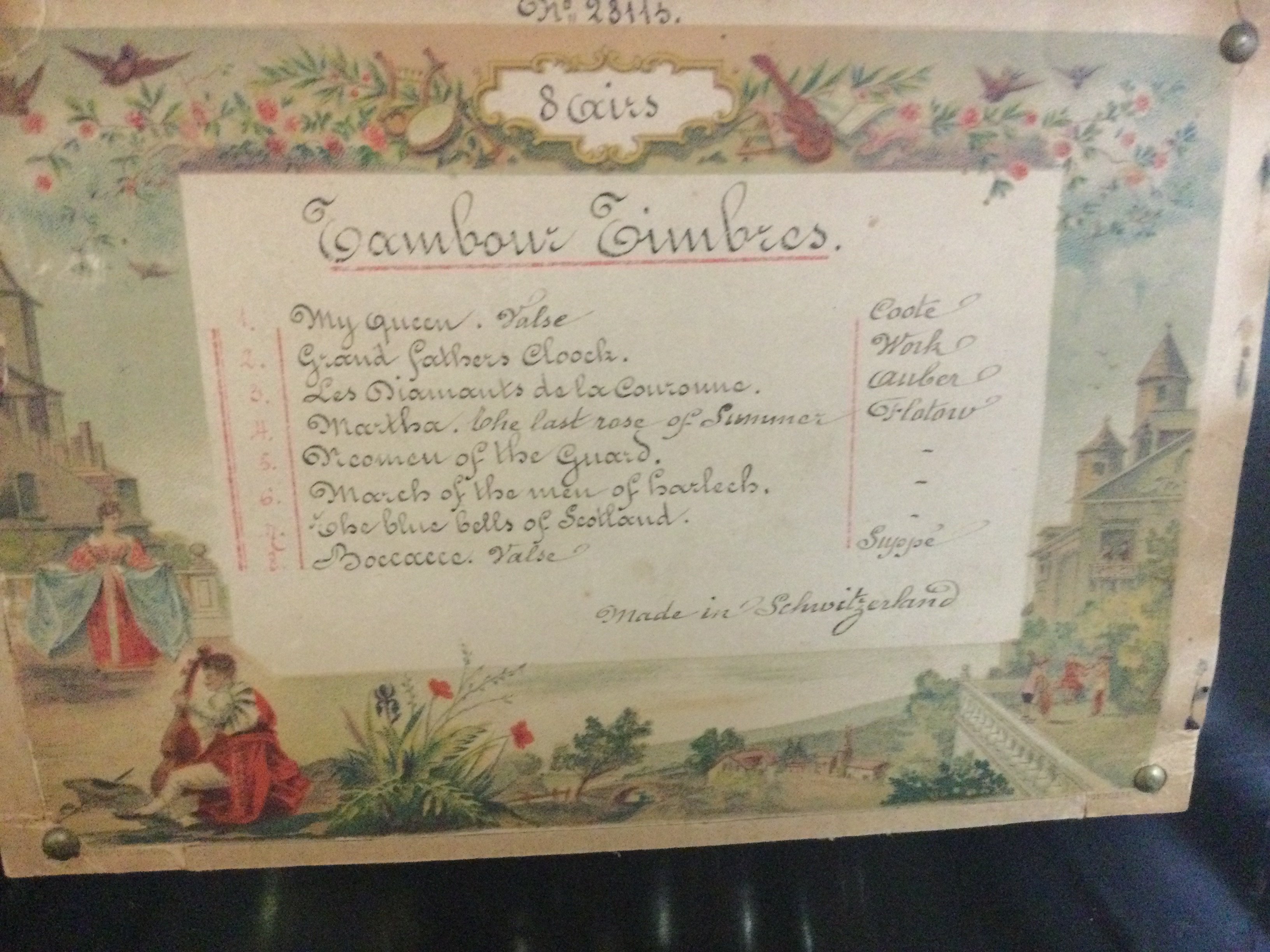 A Victorian rosewood musical box 8 Airs .striking with drum and bells .