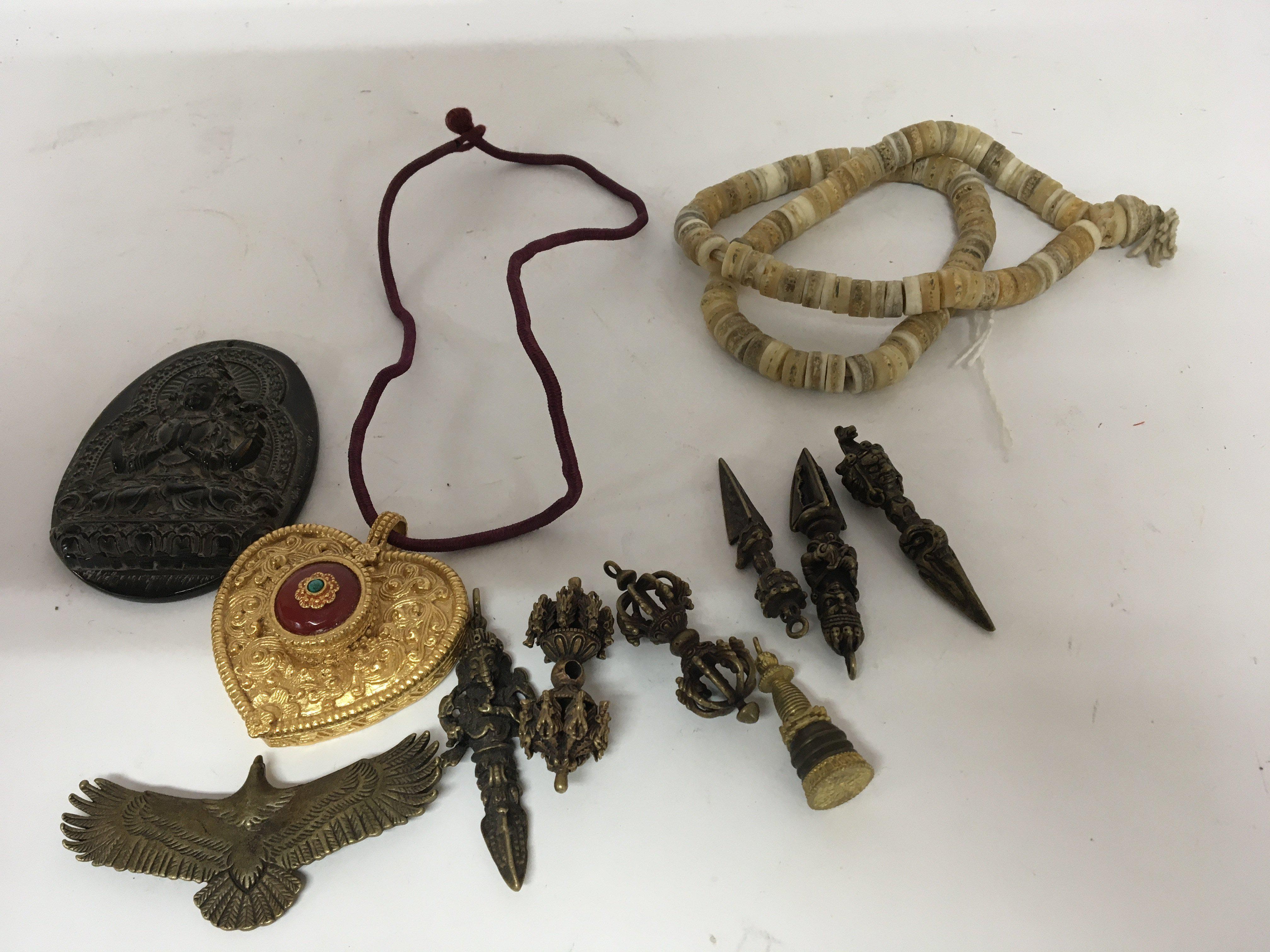 A collection of Buddhistic and Tibetan items.