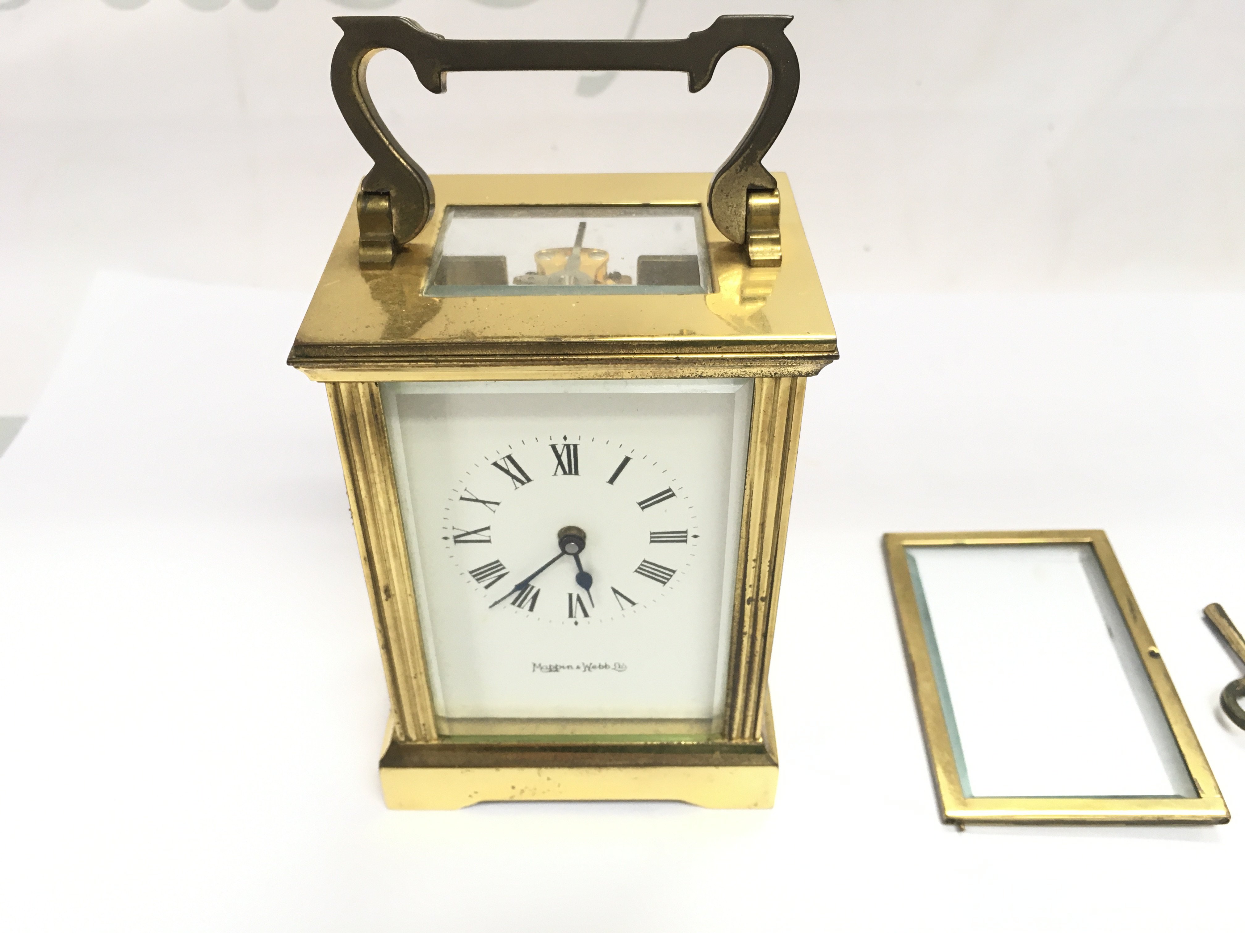 A Mappin and web carriage clock which winds and runs. Door is off.