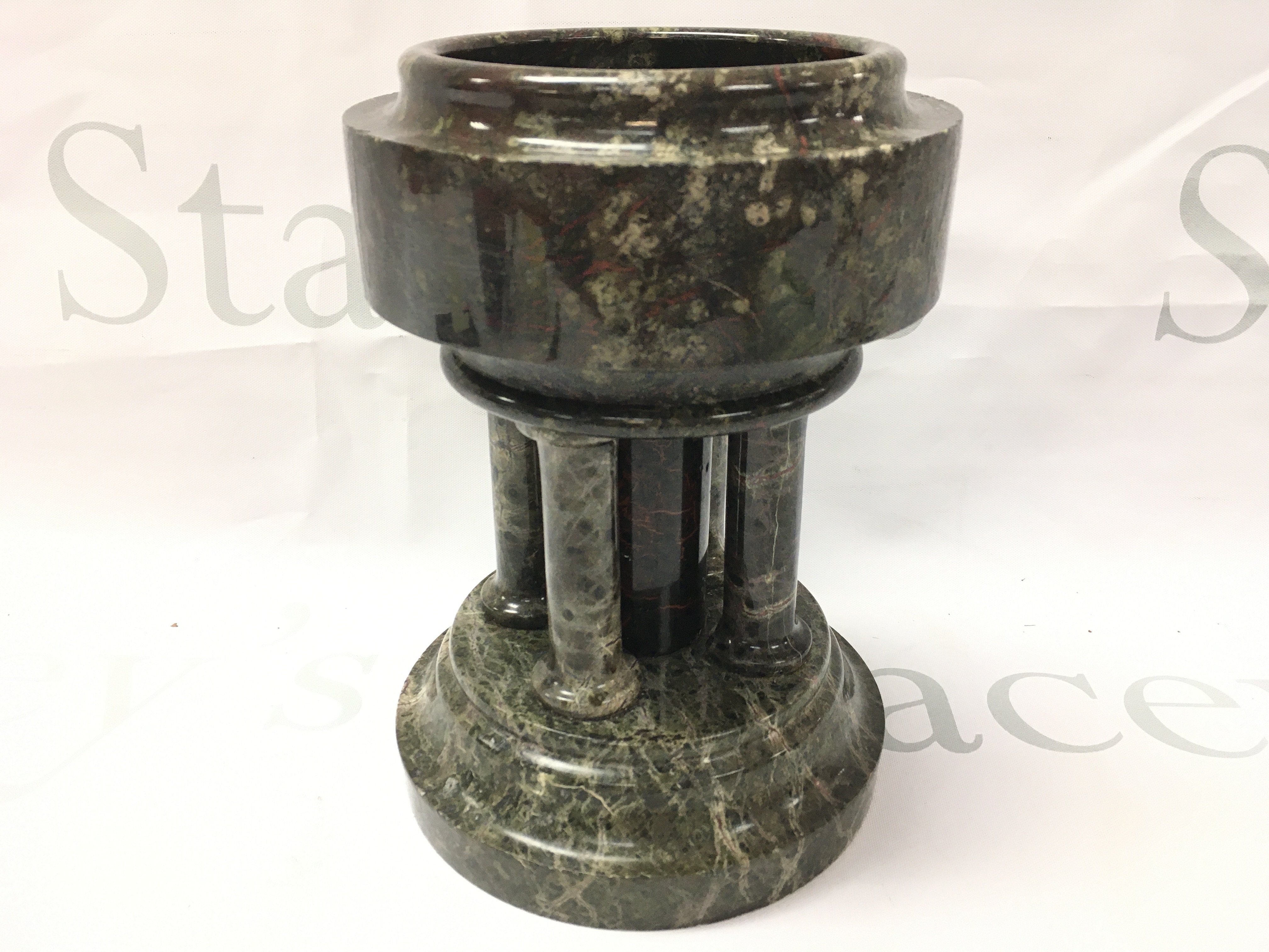 A Cornish Serpentine Marble model Holy Water Front.